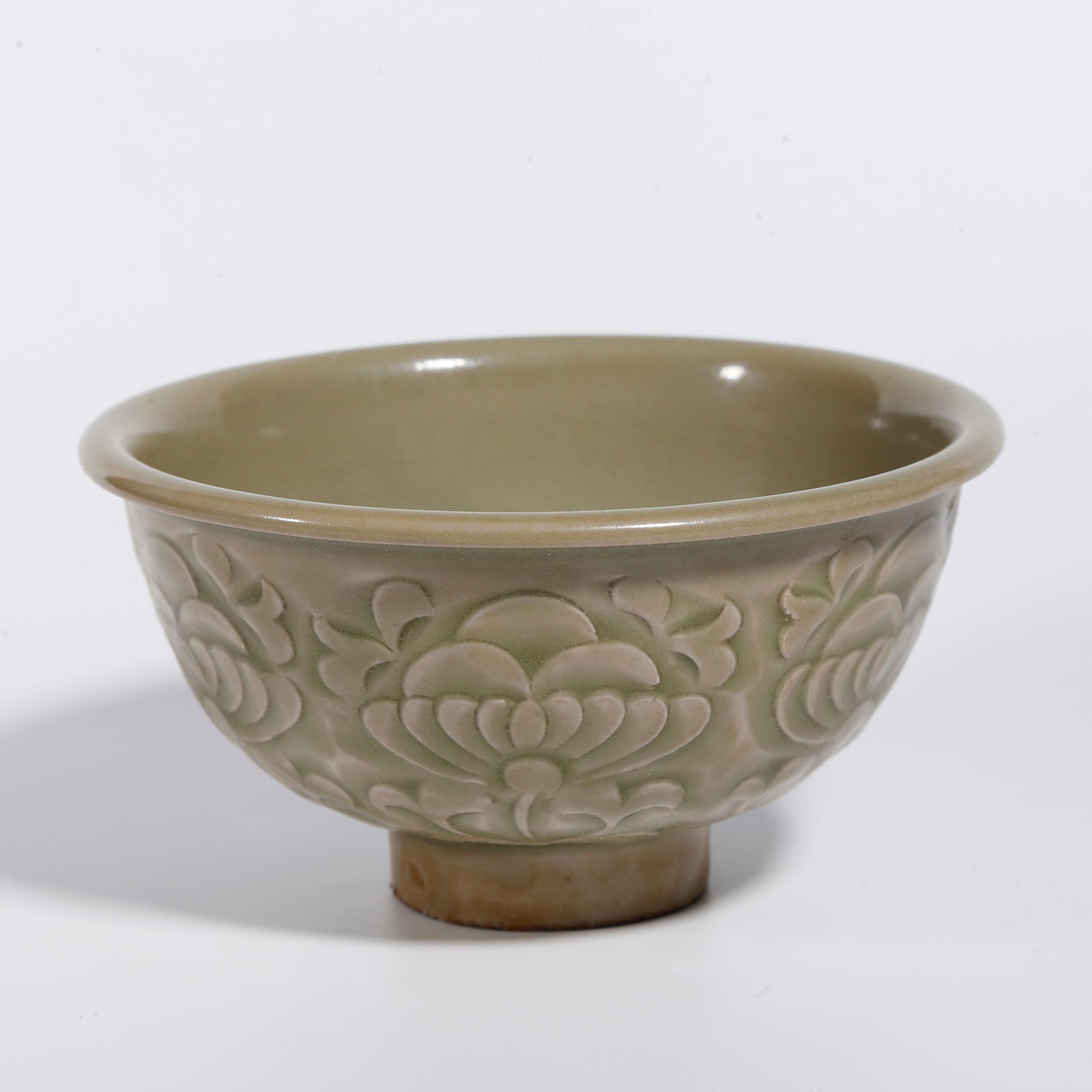 A YAOZHOU KILN BOWL WITH INTERLOCKING FLORAL PATTERN: Yaozhou Kiln Bowl with Interlocking Floral Pattern