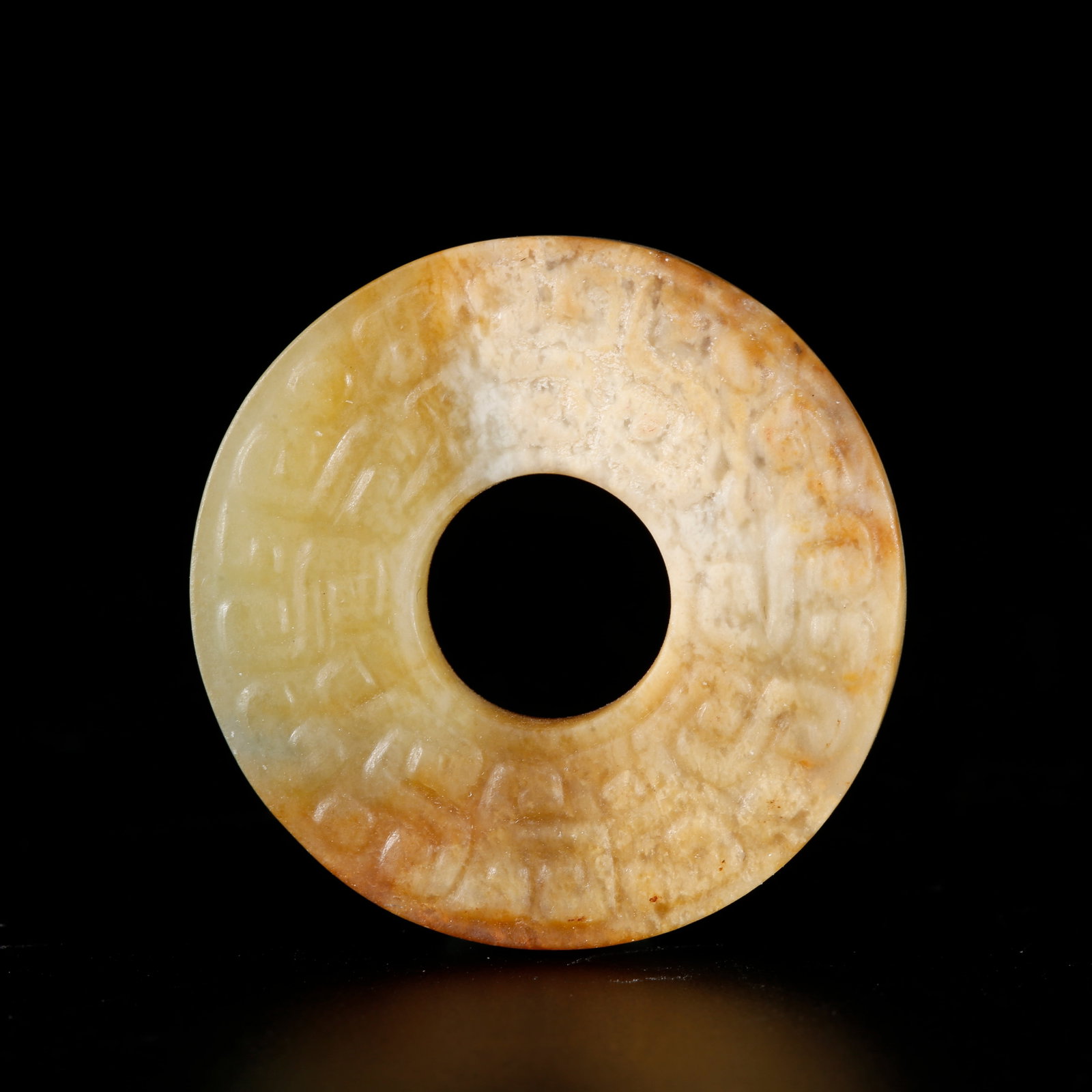 A SMALL YELLOW HETIAN JADE LINKED BI DISC: Small Yellow Hetian Jade Linked Bi Disc