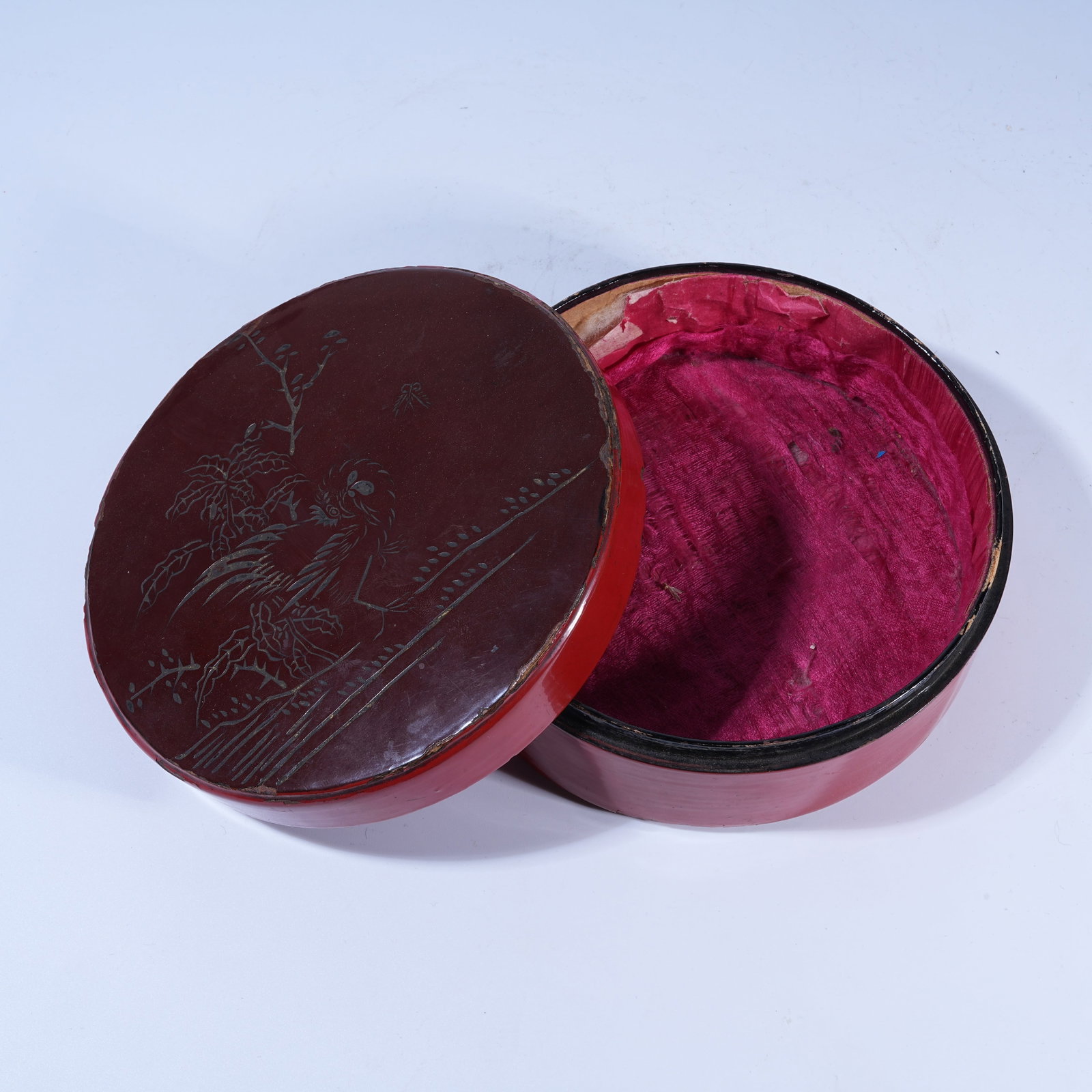 A RED CARVED LACQUER COVERED BOX WITH LANDSCAPE PATTERN (1 of 10)