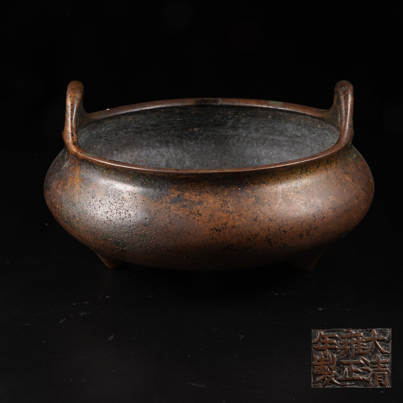 A BRONZE THREE-FOOT TWO-EAR CENSER: Bronze Three-foot Two-ear Censer