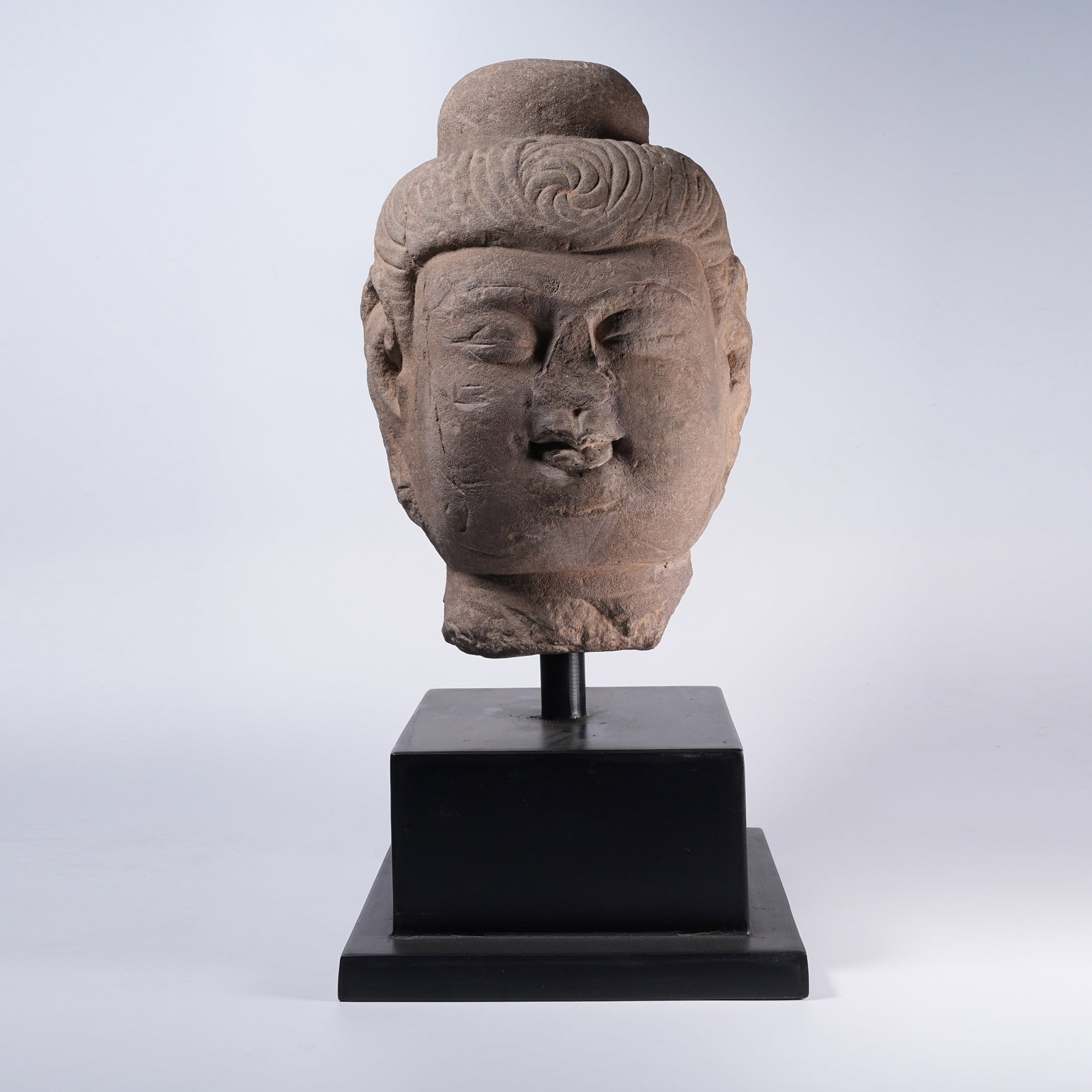 A BLUESTONE BUDDHA HEAD (1 of 9)