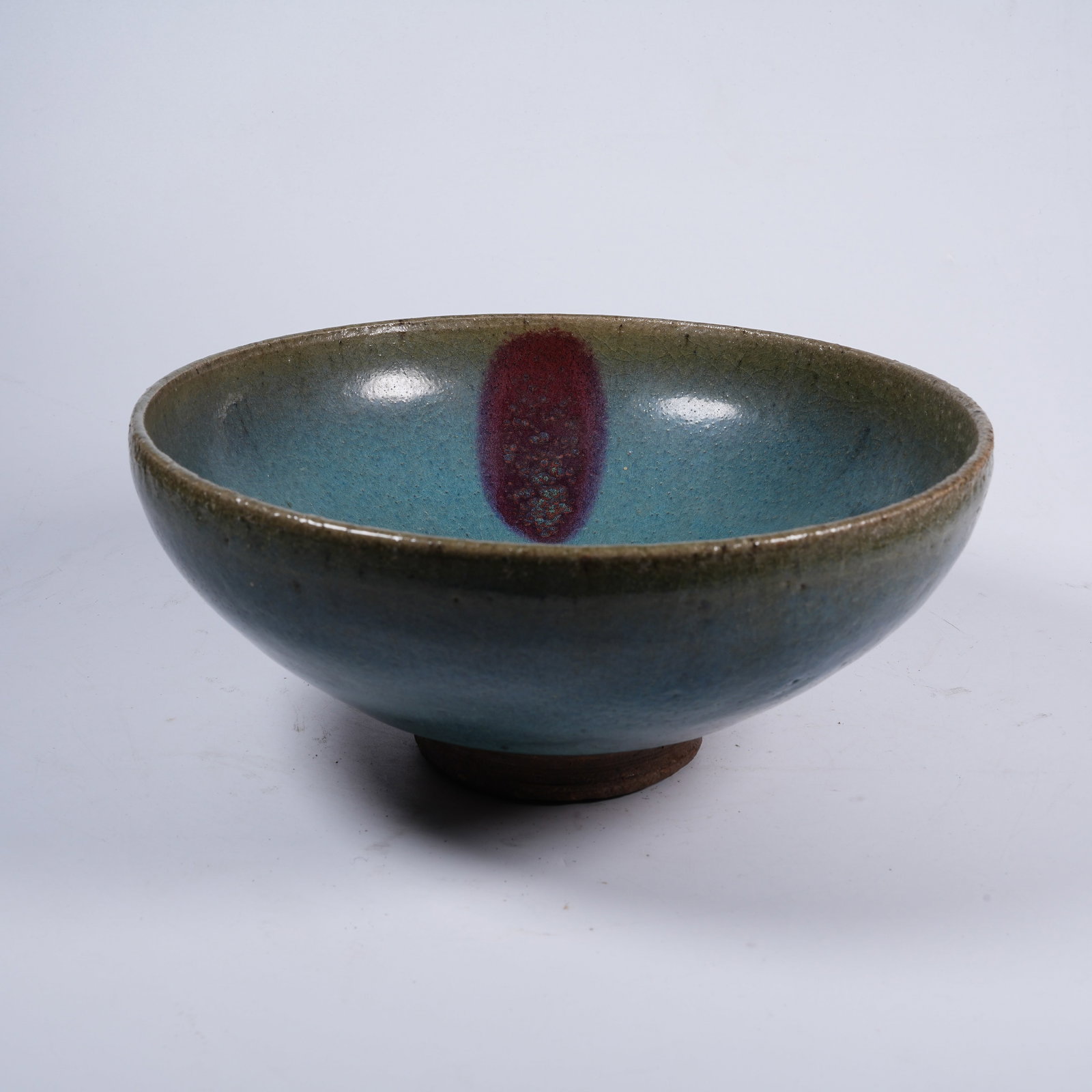 A JUN WARE LARGE BOWL WITH PURPLE SPLASHES: Jun Ware Large Bowl with Purple Splashes