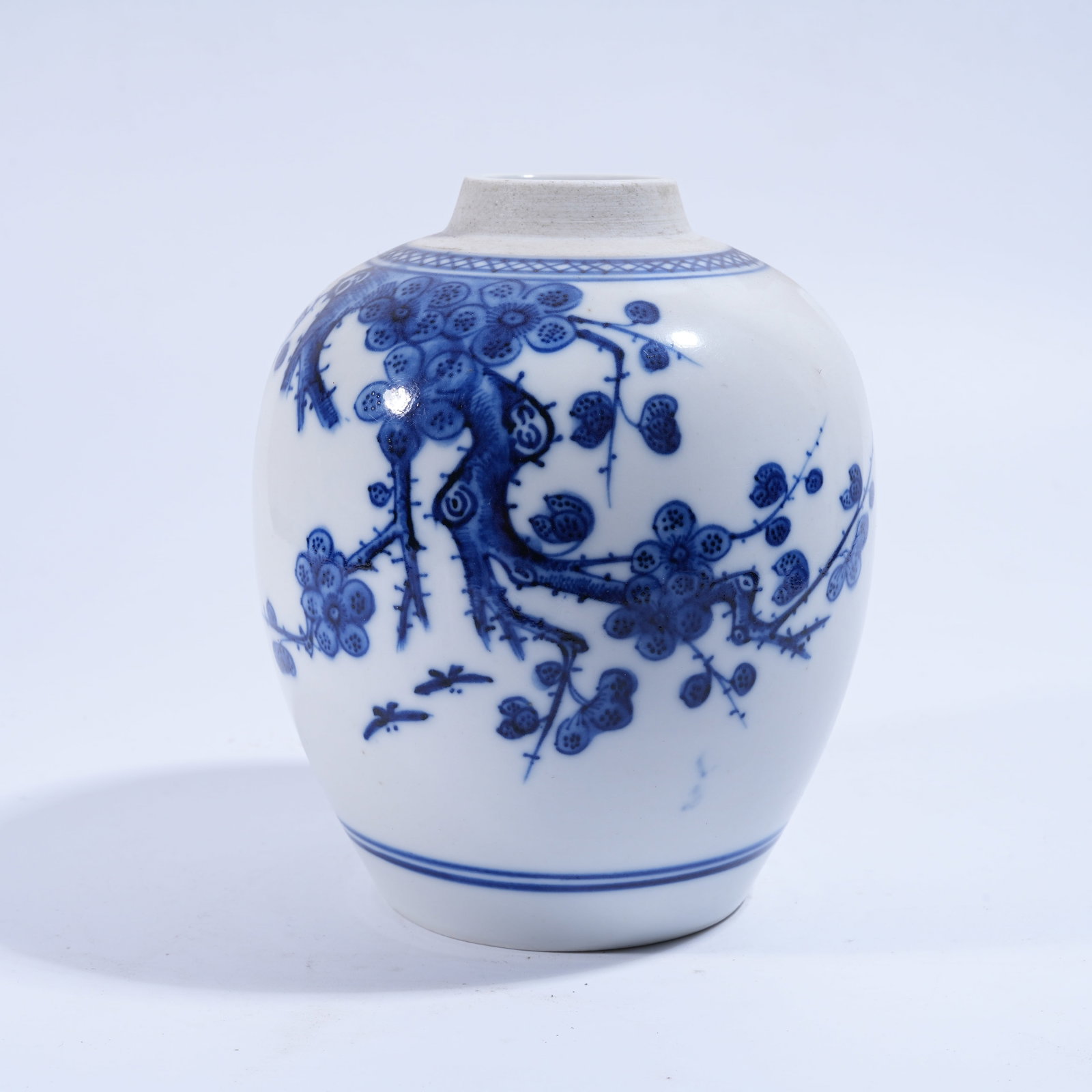 A BLUE AND WHITE JAR WITH AUSPICIOUS FRUIT PATTERN: Blue and White Jar with Auspicious Fruit Pattern