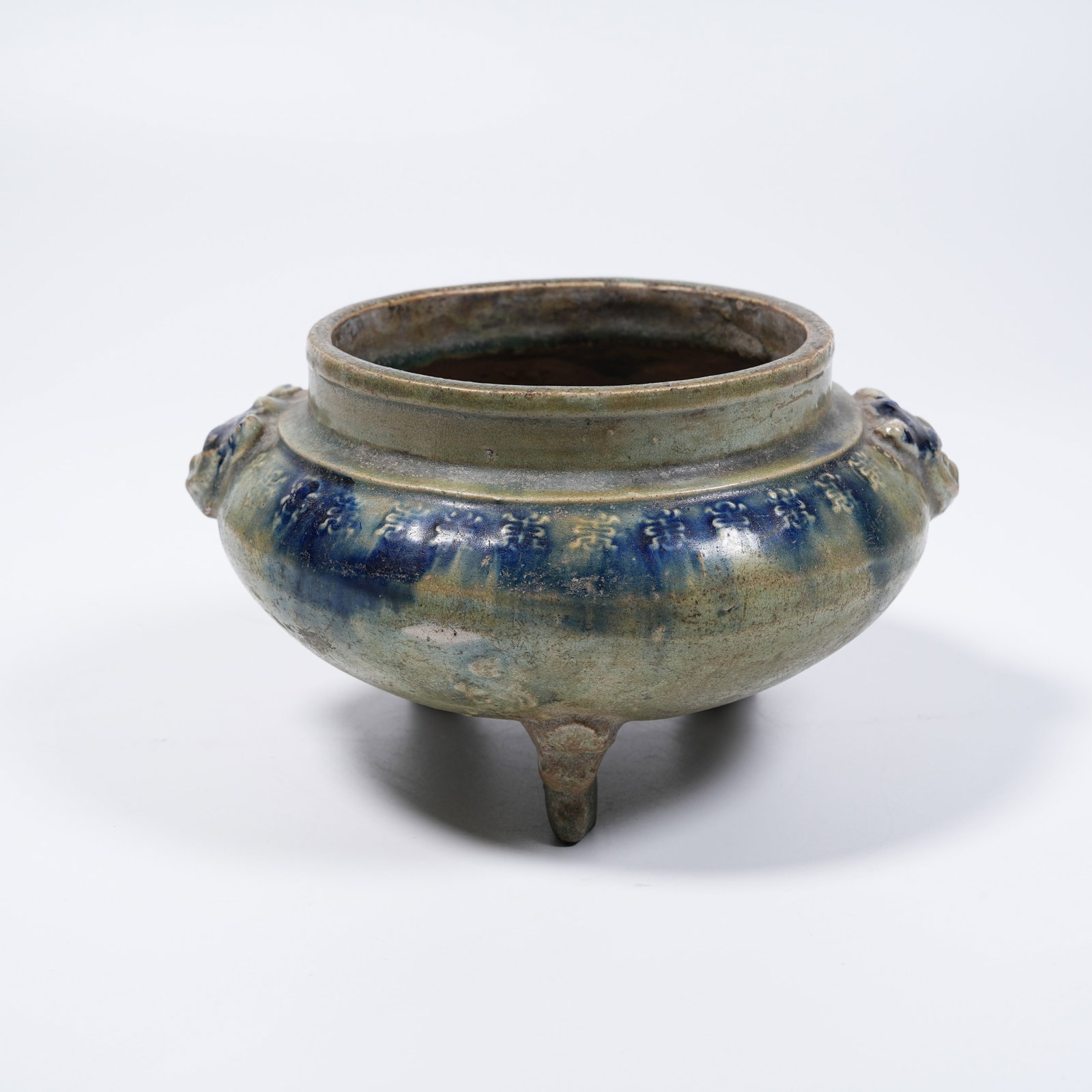 A FAHUA GLAZE BEAST-EARED CENSER: Fahua Glaze Beast-eared Censer