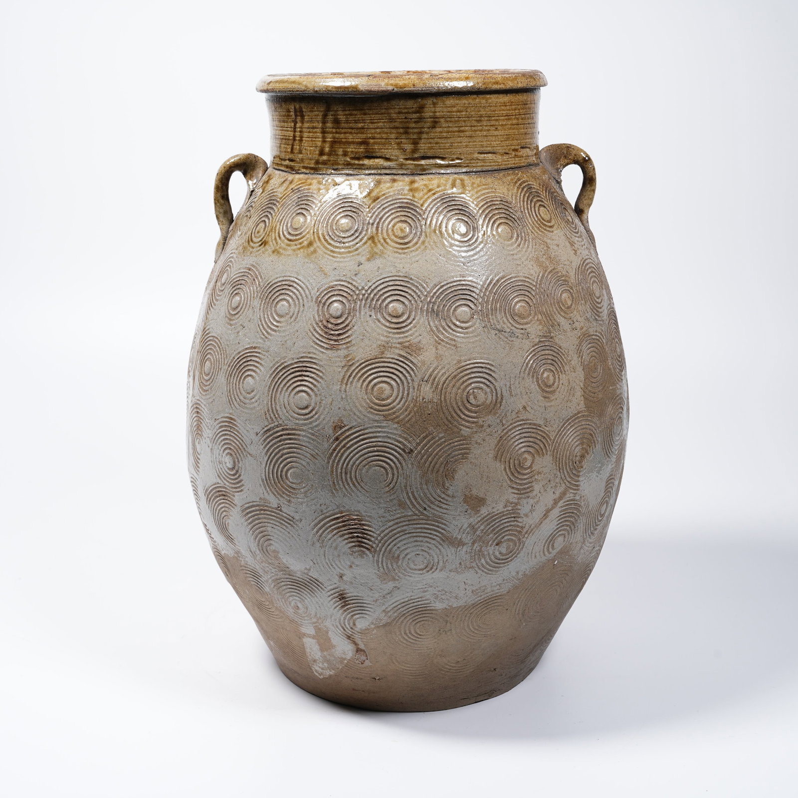 A CELADON WAVE PATTERN JAR - 7