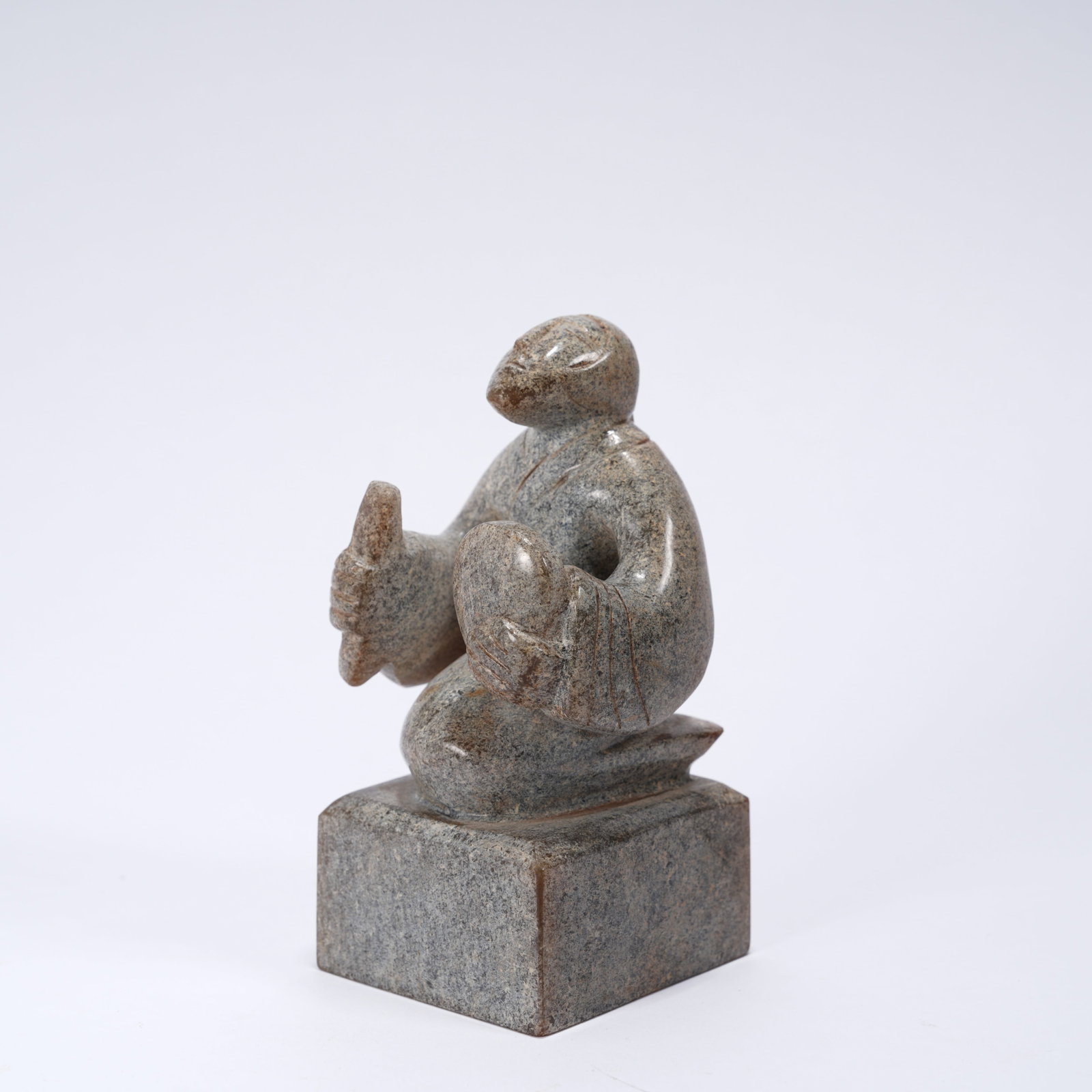 A ANCIENT JADE SEAL WITH KNEELING FIGURE KNOB (1 of 9)