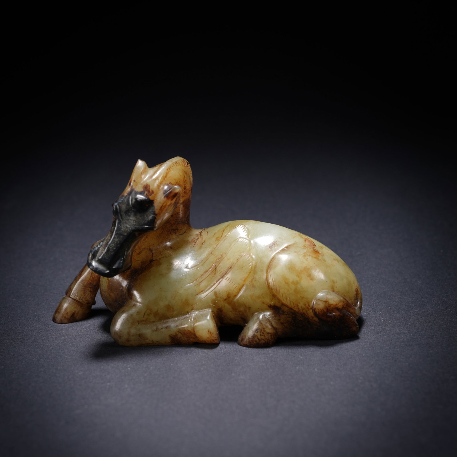 A ANCIENT JADE HEAVENLY HORSE ORNAMENT: Ancient jade heavenly horse ornament