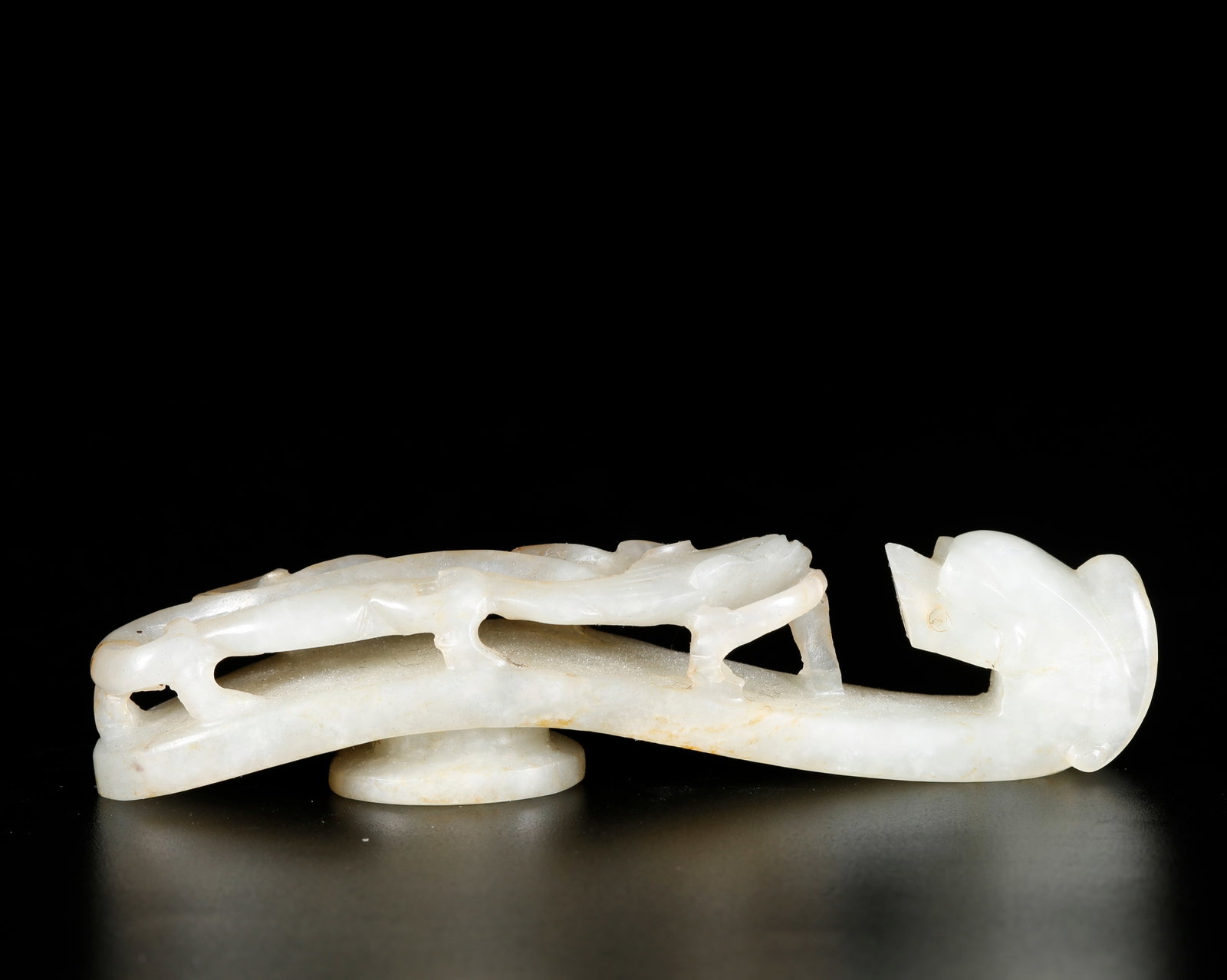 A DRAGON-SHAPED BELT HOOK CARVED FROM HETIAN JADE (1 of 10)