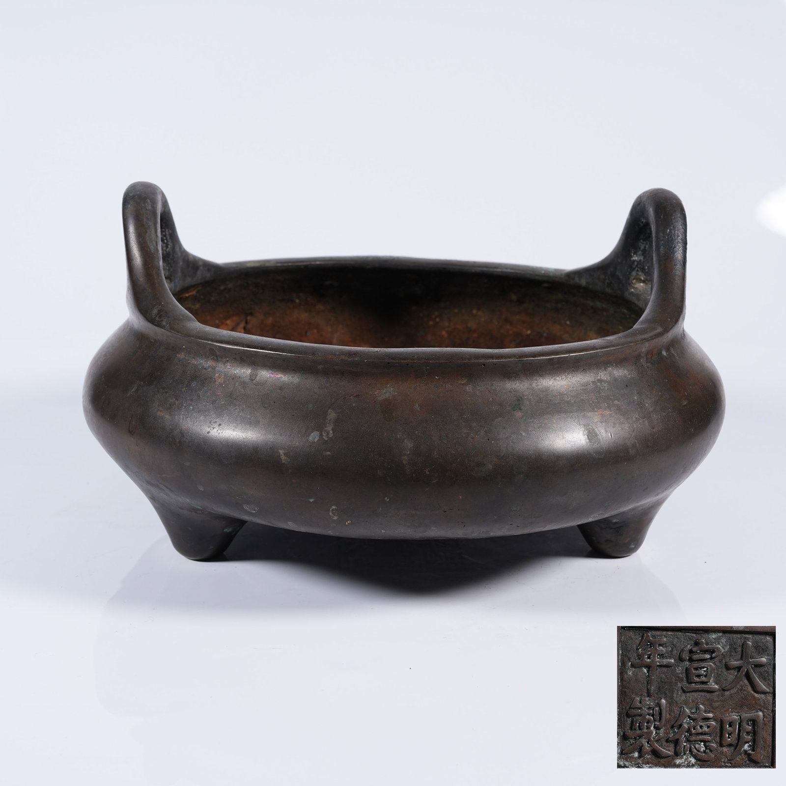 A BRONZE THREE-LEGGED UPRIGHT-EAR INCENSE BURNER (1 of 9)
