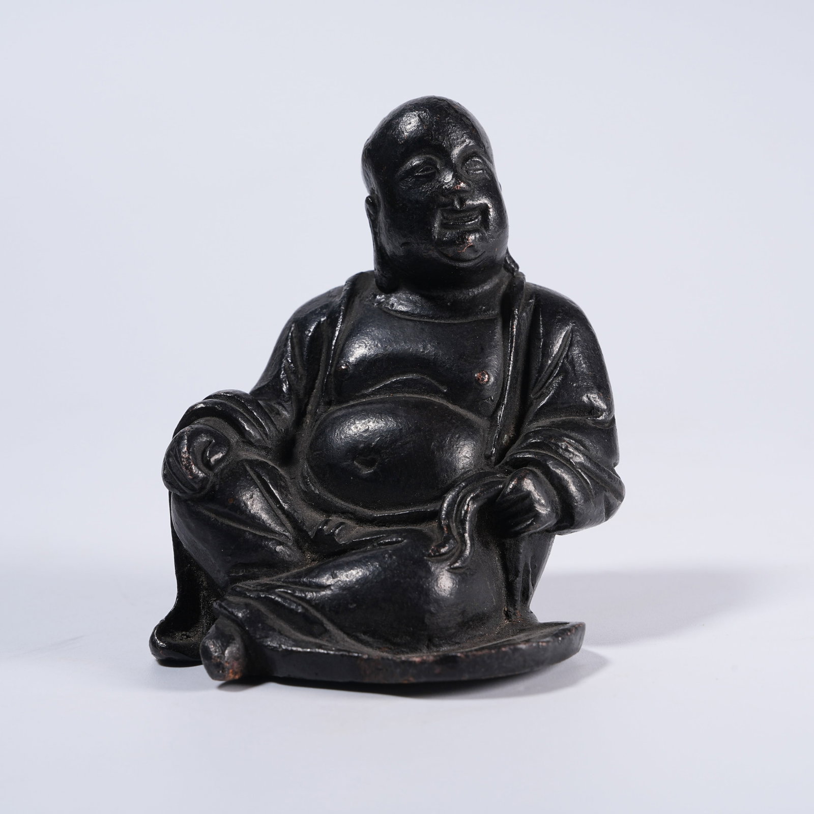 A BRONZE SEATED MAITREYA STATUE (1 of 8)