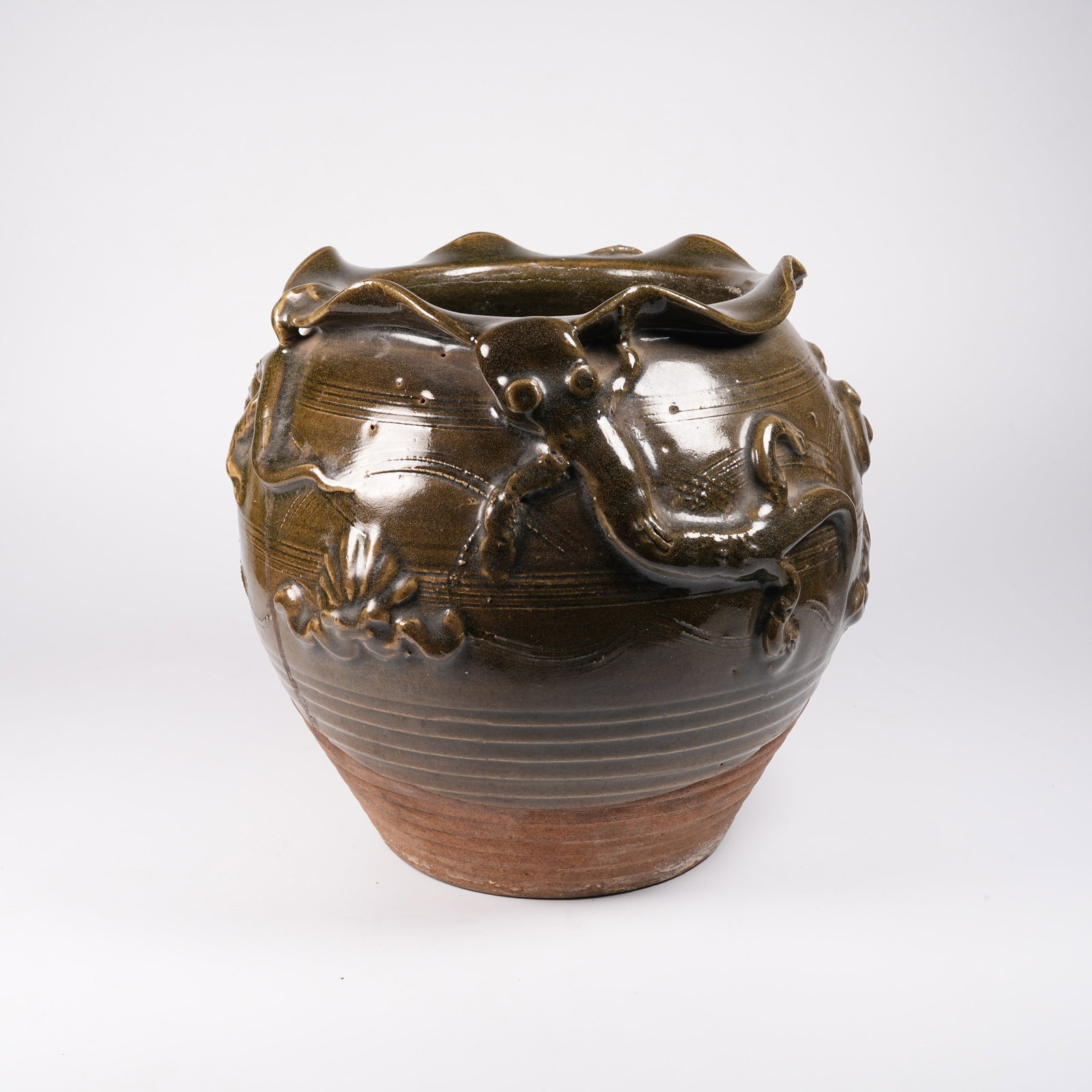 A CELADON FLOWER-MOUTHED JAR WITH CHILONG DRAGON PATTERN (1 of 9)