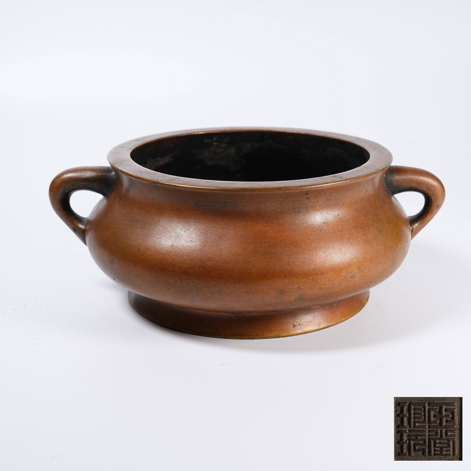 A BRONZE CRICKET-EARED CENSER (1 of 9)