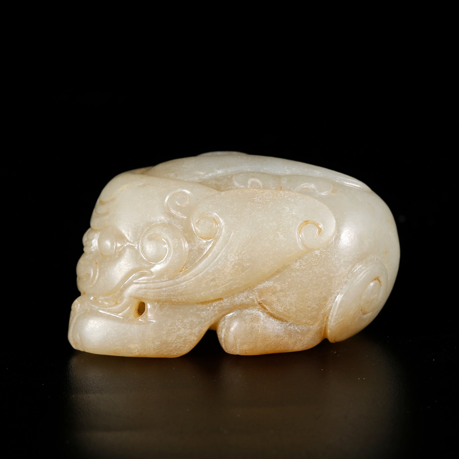A HETIAN JADE BEAST-SHAPED ORNAMENT (1 of 8)