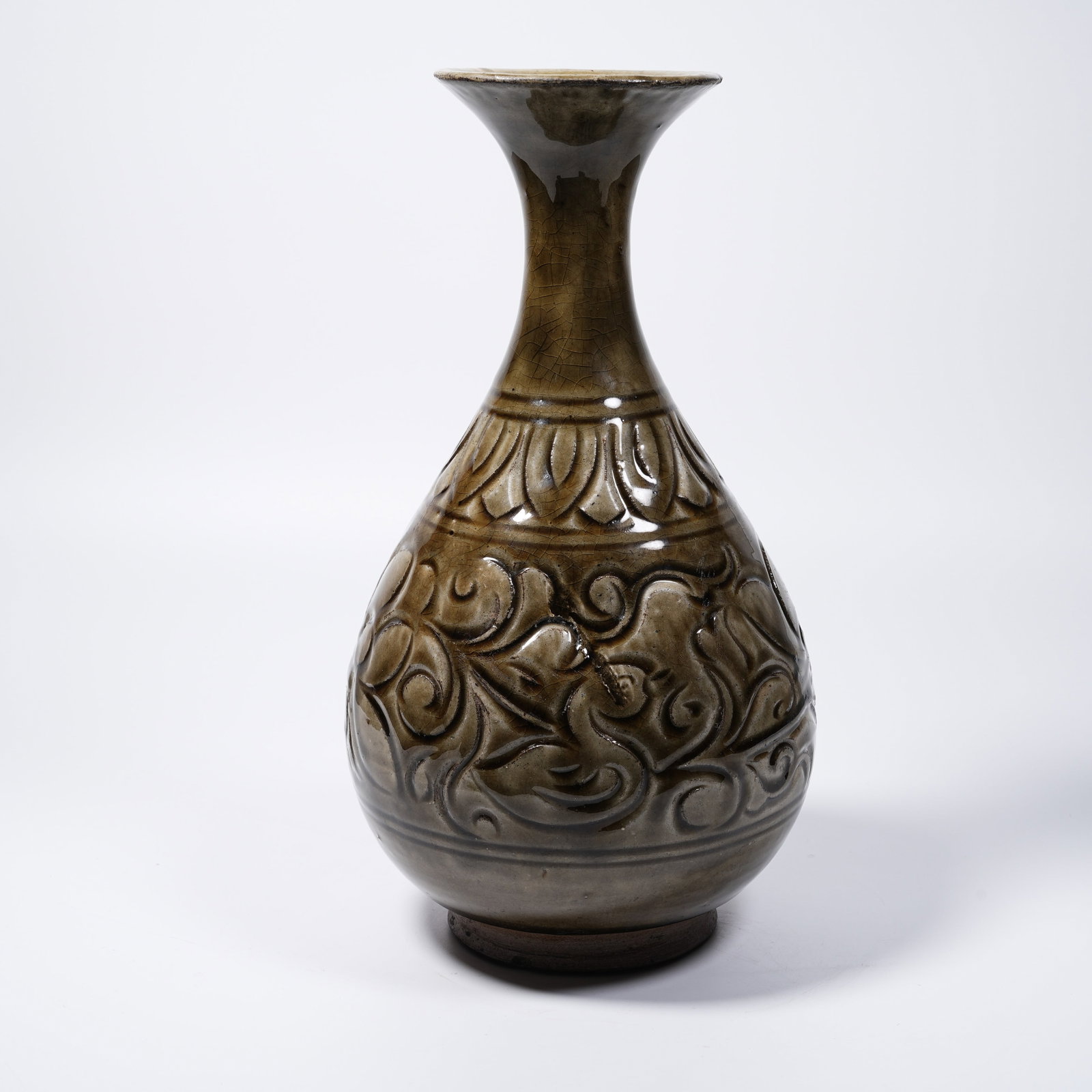 A YAOZHOU KILN GOOSE-AMIDST-FLOWER PEAR-SHAPED VASE: Yaozhou Kiln Goose-amidst-Flower Pear-shaped Vase