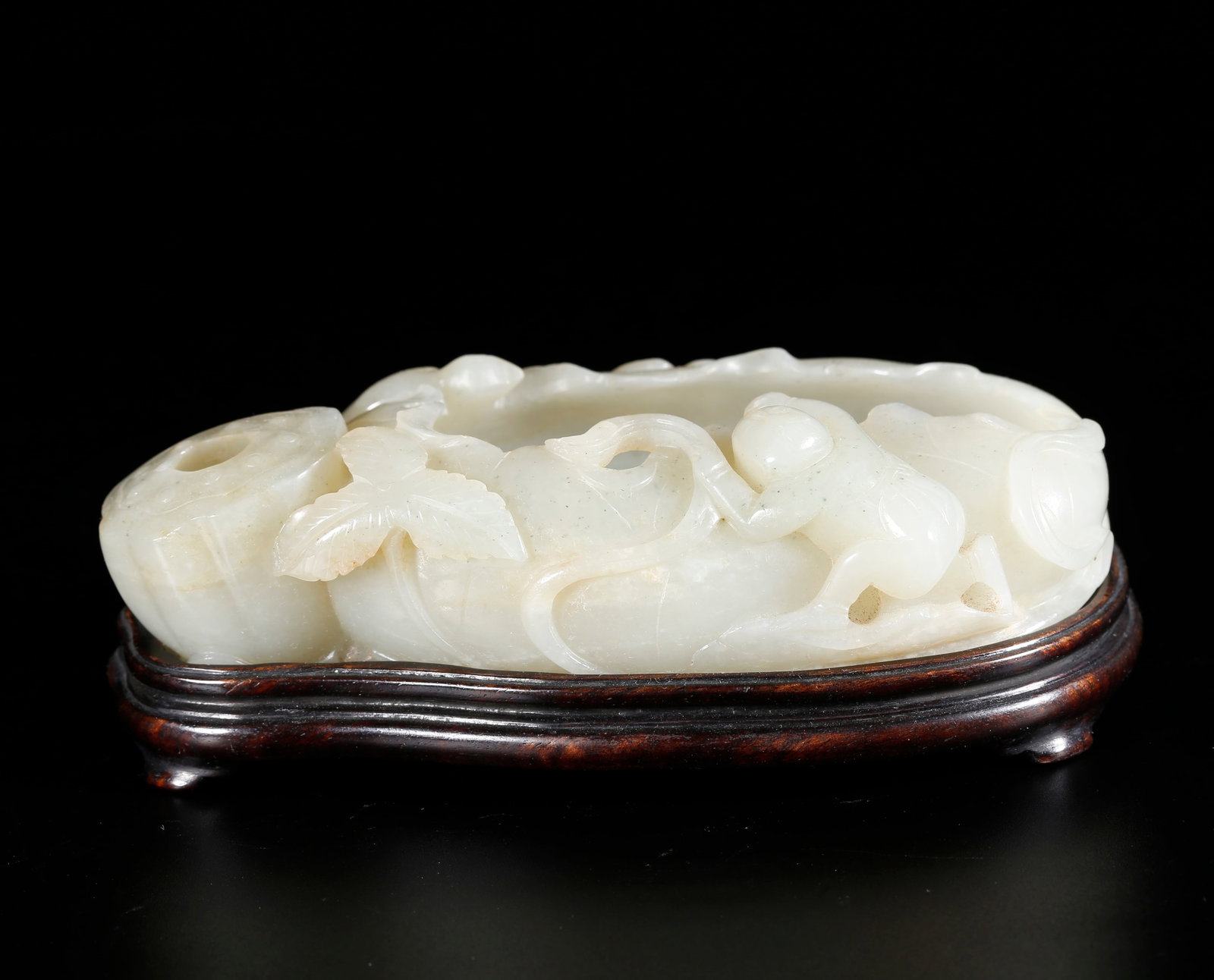 A LOTUS LEAF AND BOY PATTERN BRUSH WASHER CARVED FROM HETIAN JADE: Lotus Leaf and Boy Pattern Brush Washer Carved from Hetian Jade