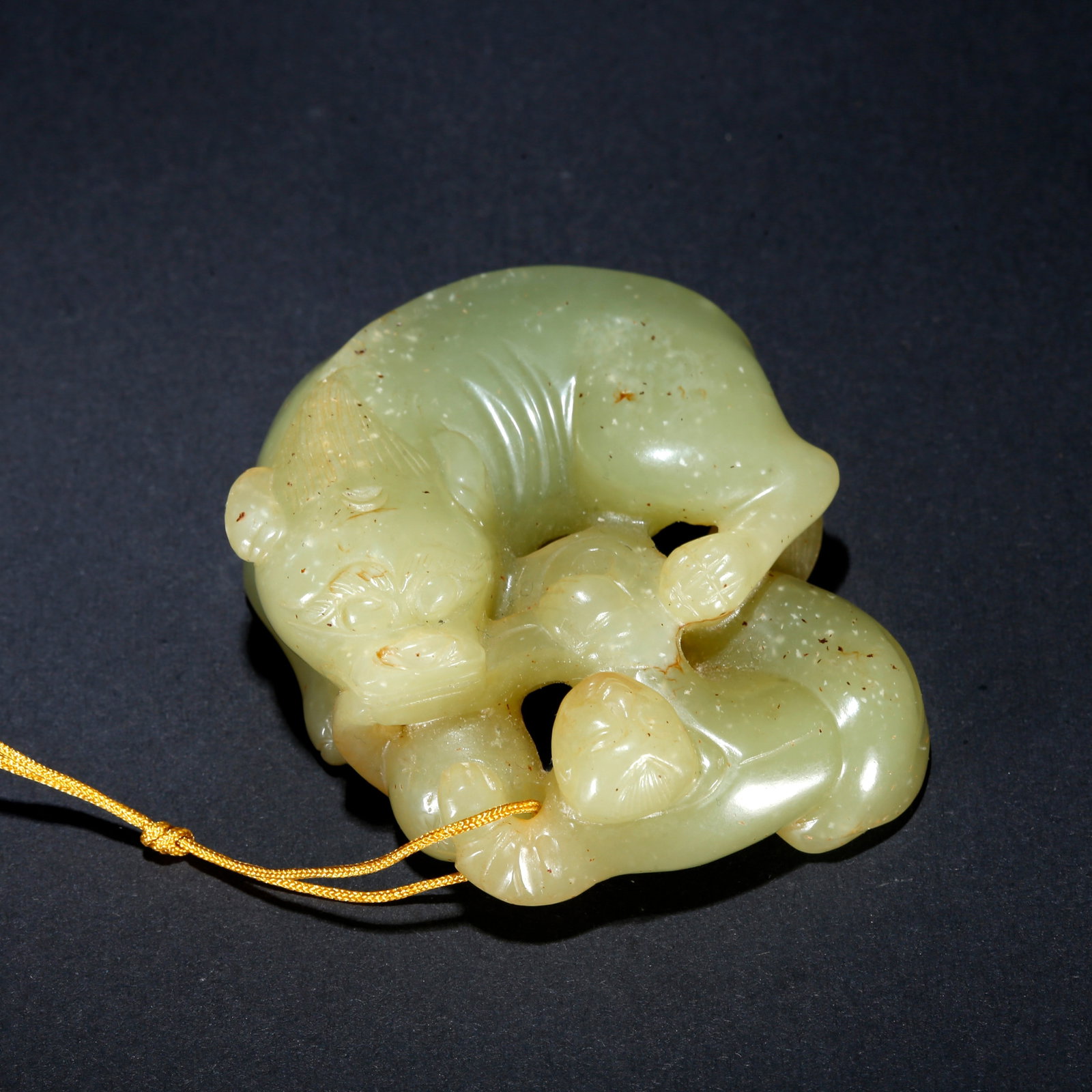 A HETIAN YELLOW JADE CARVED ORNAMENT: Hetian Yellow Jade Carved Ornament