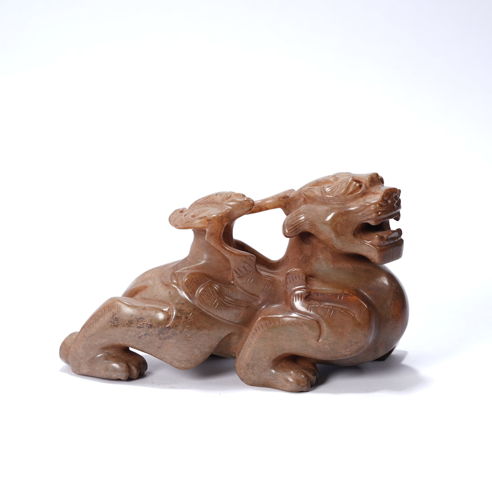 A ANCIENT JADE WINGED FIGURE RIDING BEAST ORNAMENT (1 of 7)