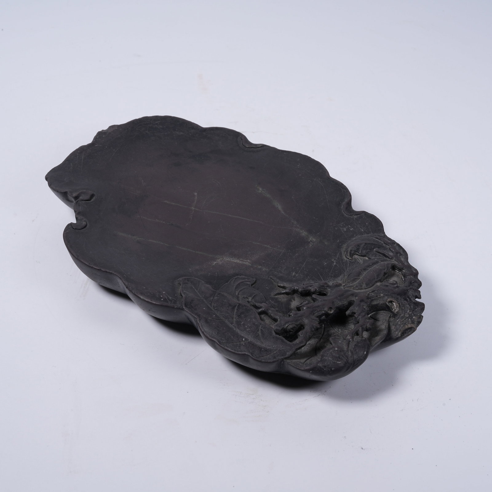 A DUAN INKSTONE IN AUSPICIOUS FRUIT FORM: Duan Inkstone in Auspicious Fruit Form