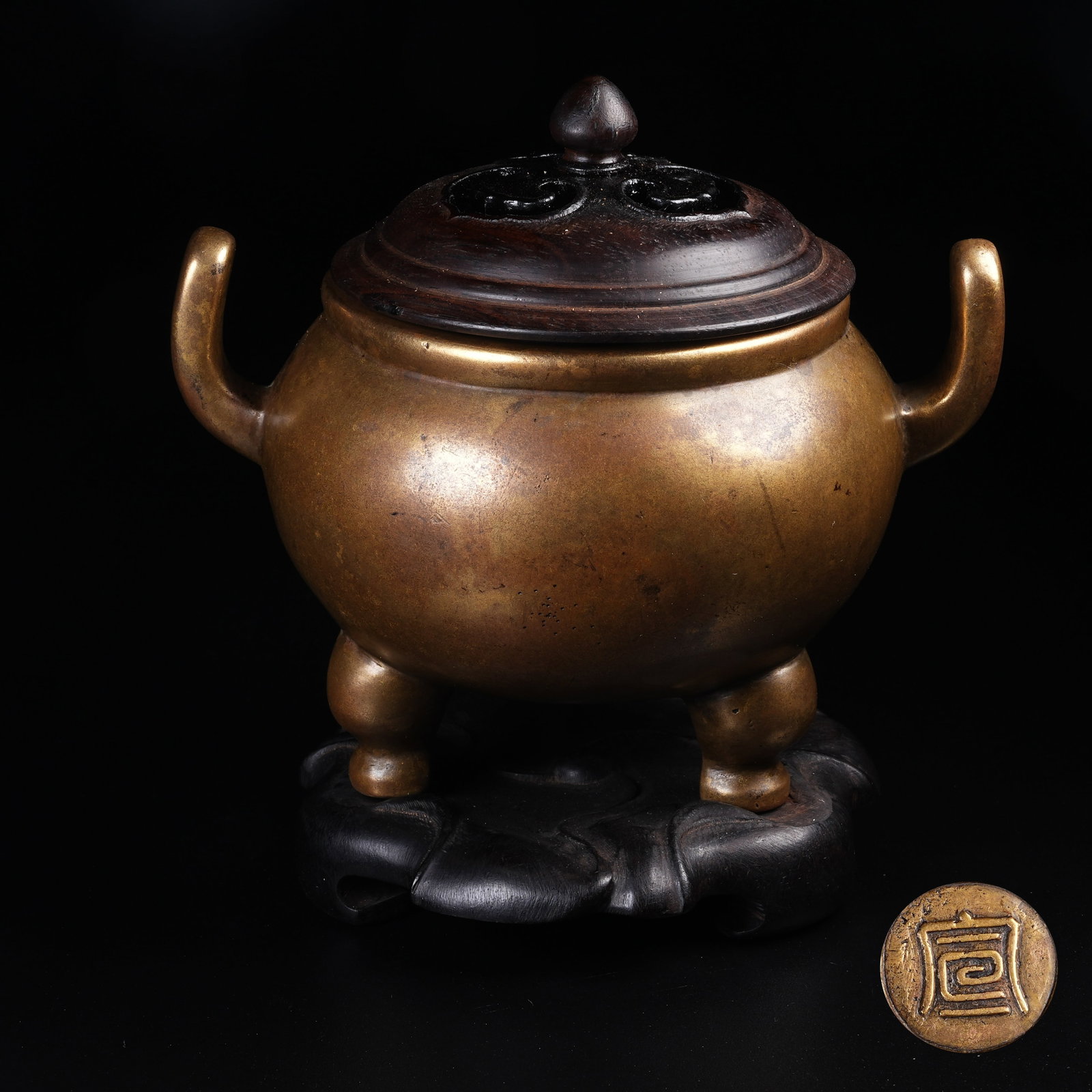 A GILT BRONZE THREE-LEGGED OFFICIAL HAT EARED INCENSE BURNER (1 of 9)