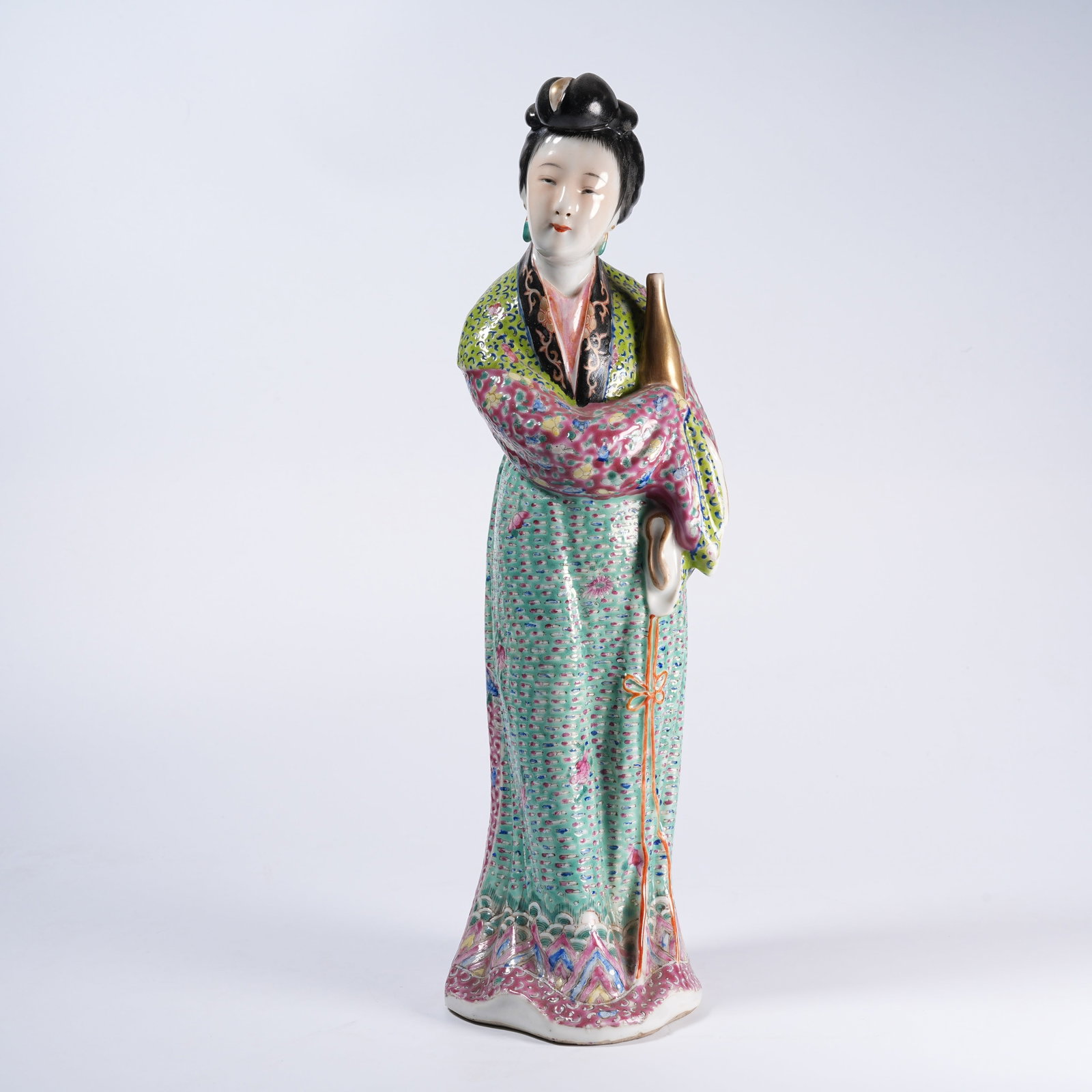 A FAMILLE ROSE STANDING BEAUTY STATUE: Famille Rose Standing Beauty Statue