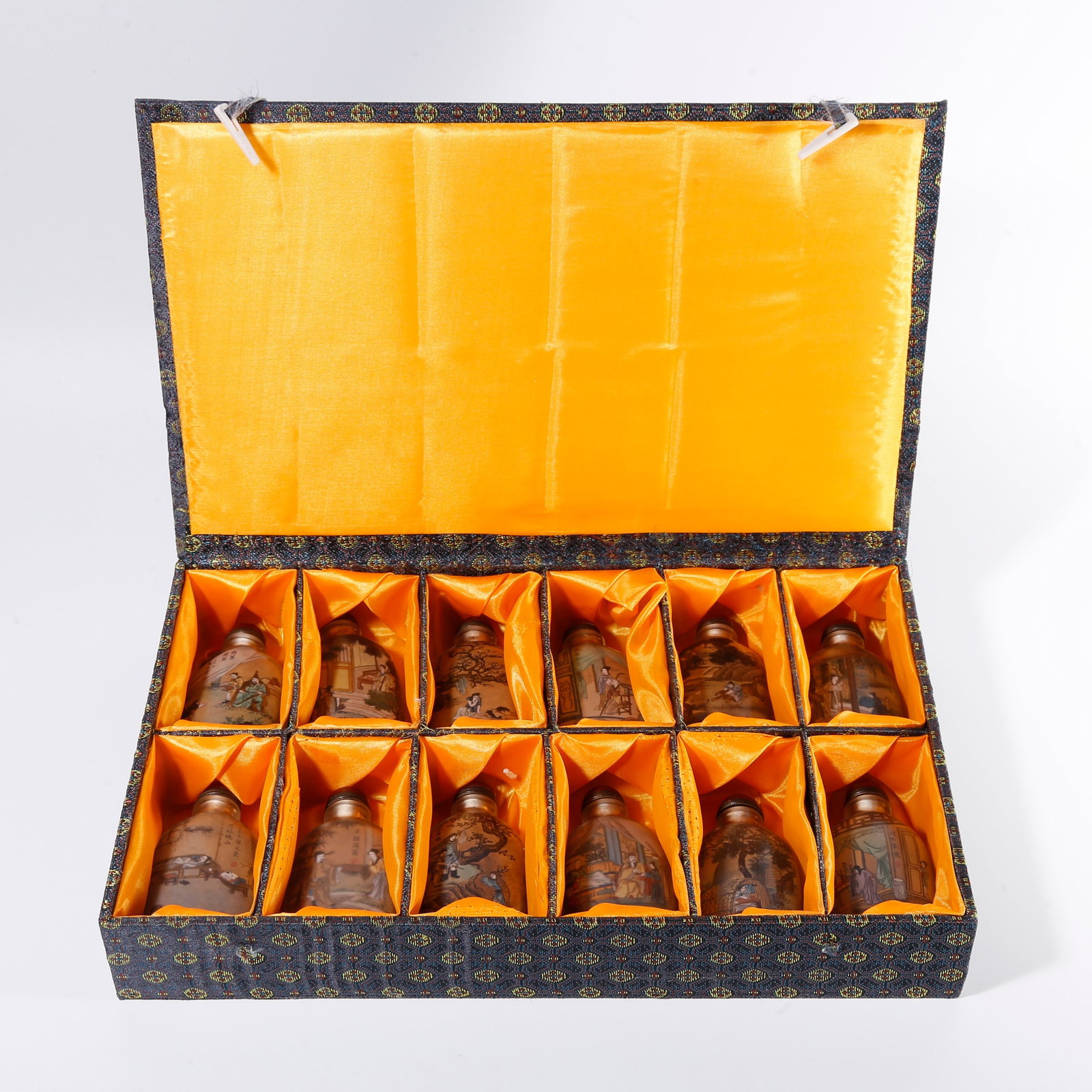 A SET OF COLORED GLAZE TWENTY-FOUR FILIAL PIETY SNUFF BOTTLES (1 of 10)