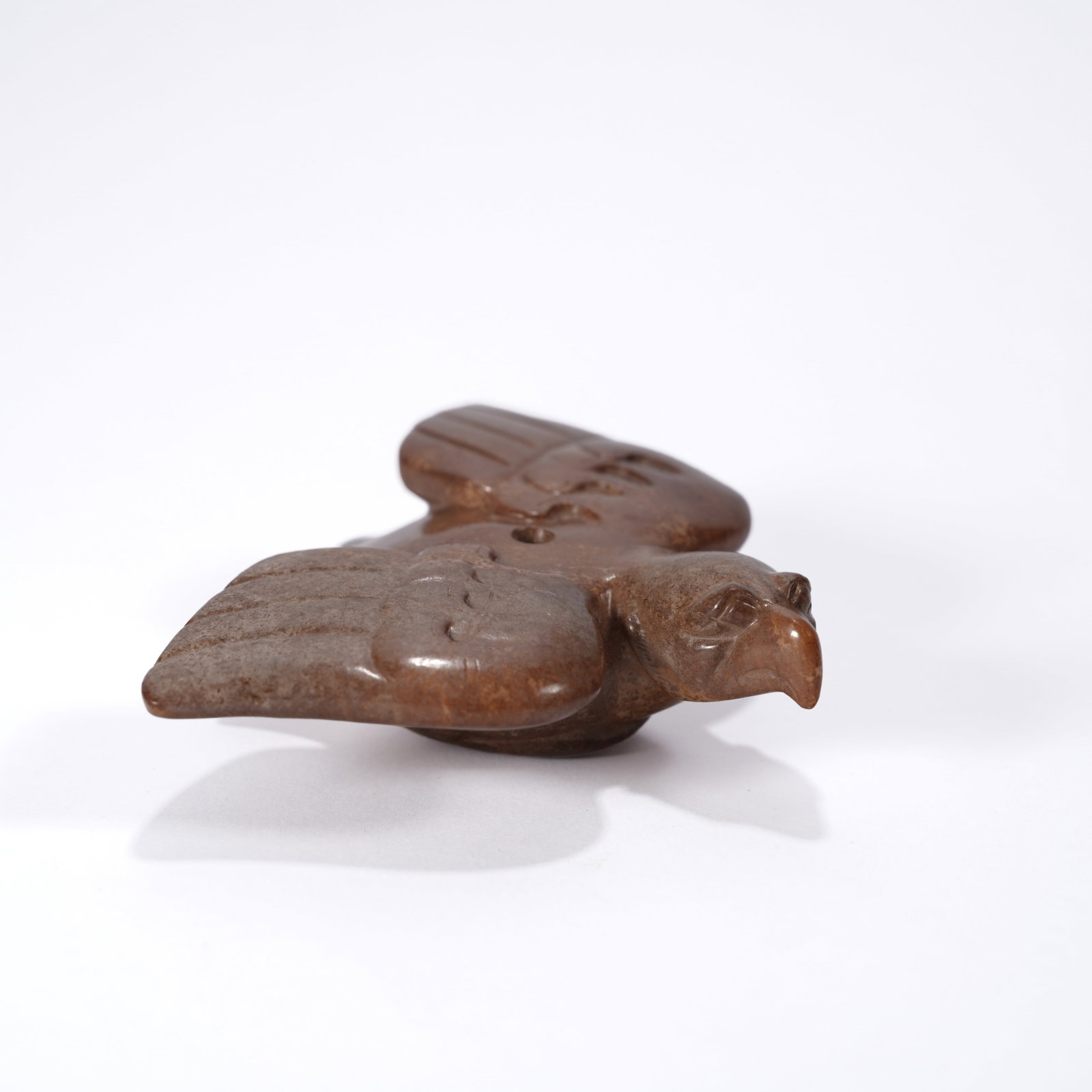 A ANCIENT JADE PHOENIX-BIRD PENDANT: Ancient jade phoenix-bird pendant