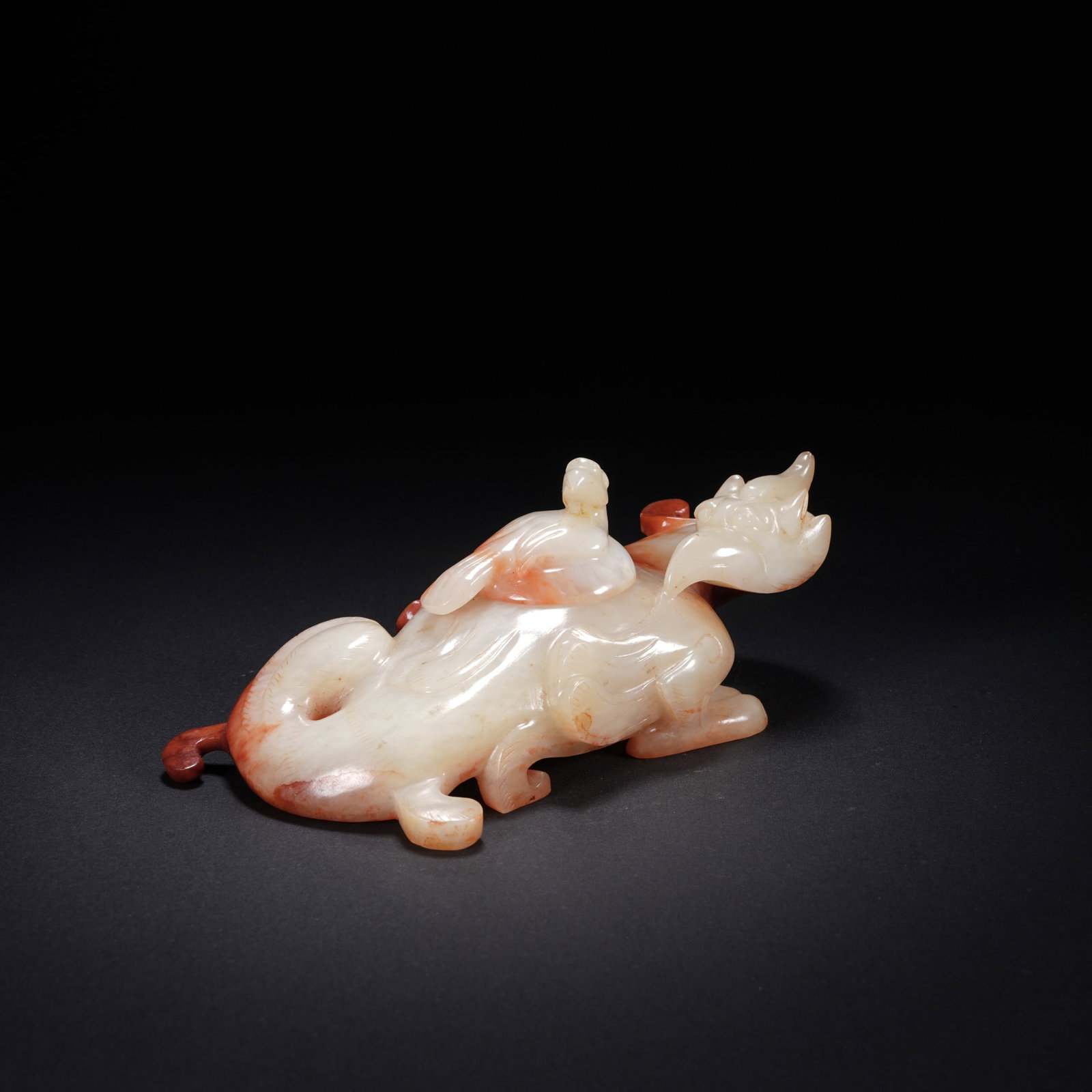 A ANCIENT JADE PHOENIX-SHAPED ZUN VESSEL (1 of 7)