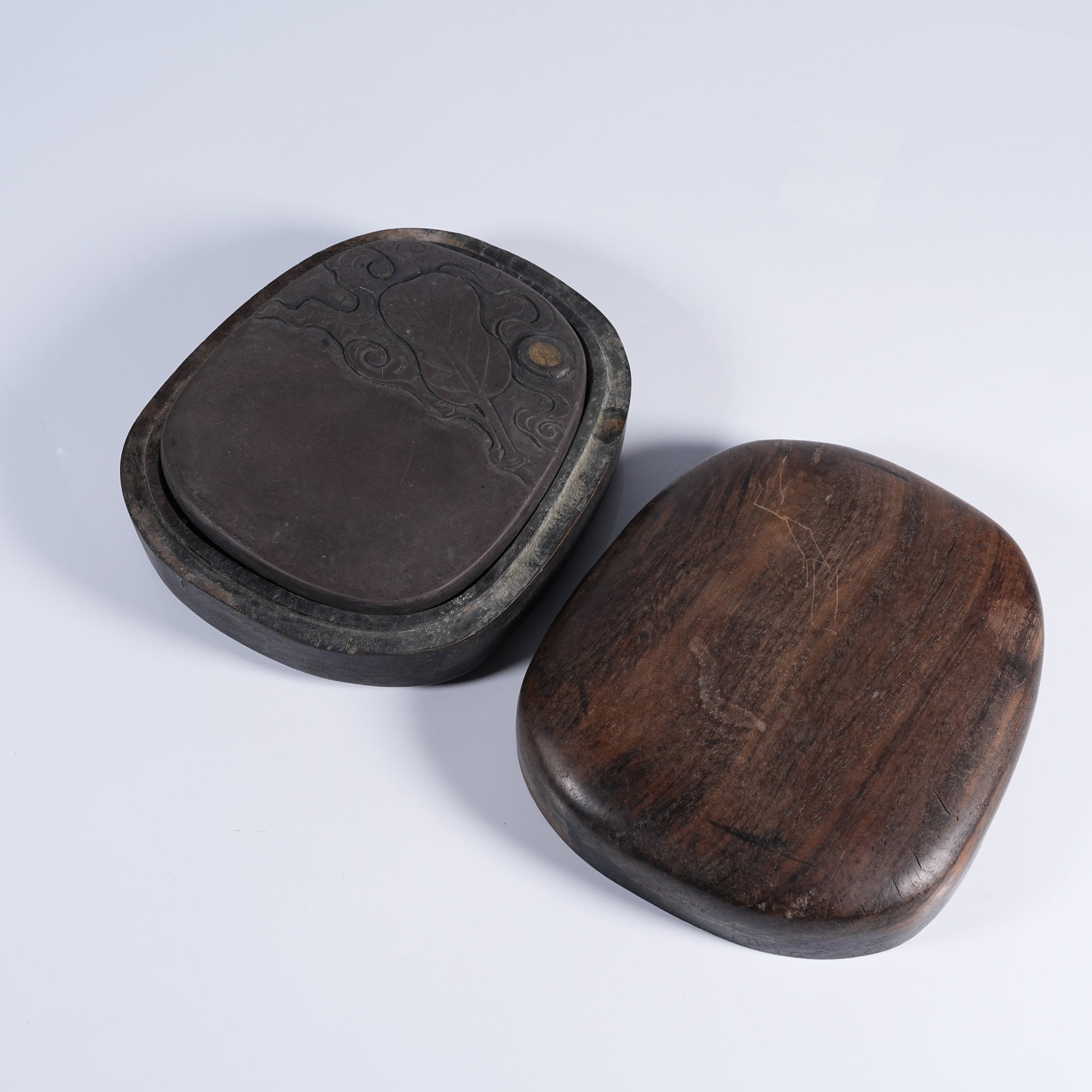 A DUAN STONE TREASURE PATTERN INK SLAB WITH HUANGHUALI WOOD BOX (1 of 10)