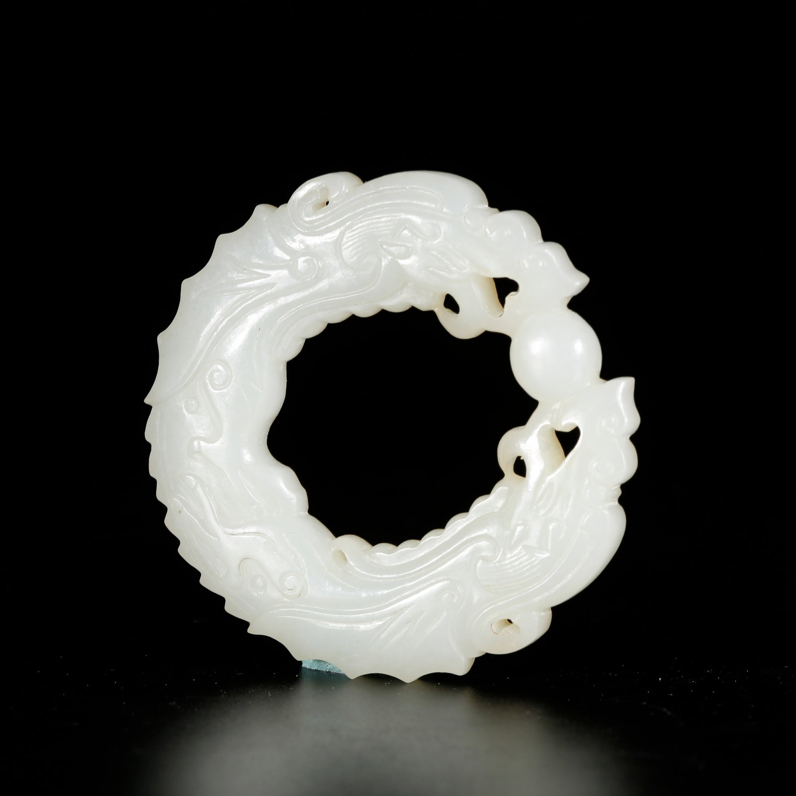 A HETIAN JADE HANGING ORNAMENT WITH DRAGON PATTERN: Hetian Jade Hanging Ornament with Dragon Pattern