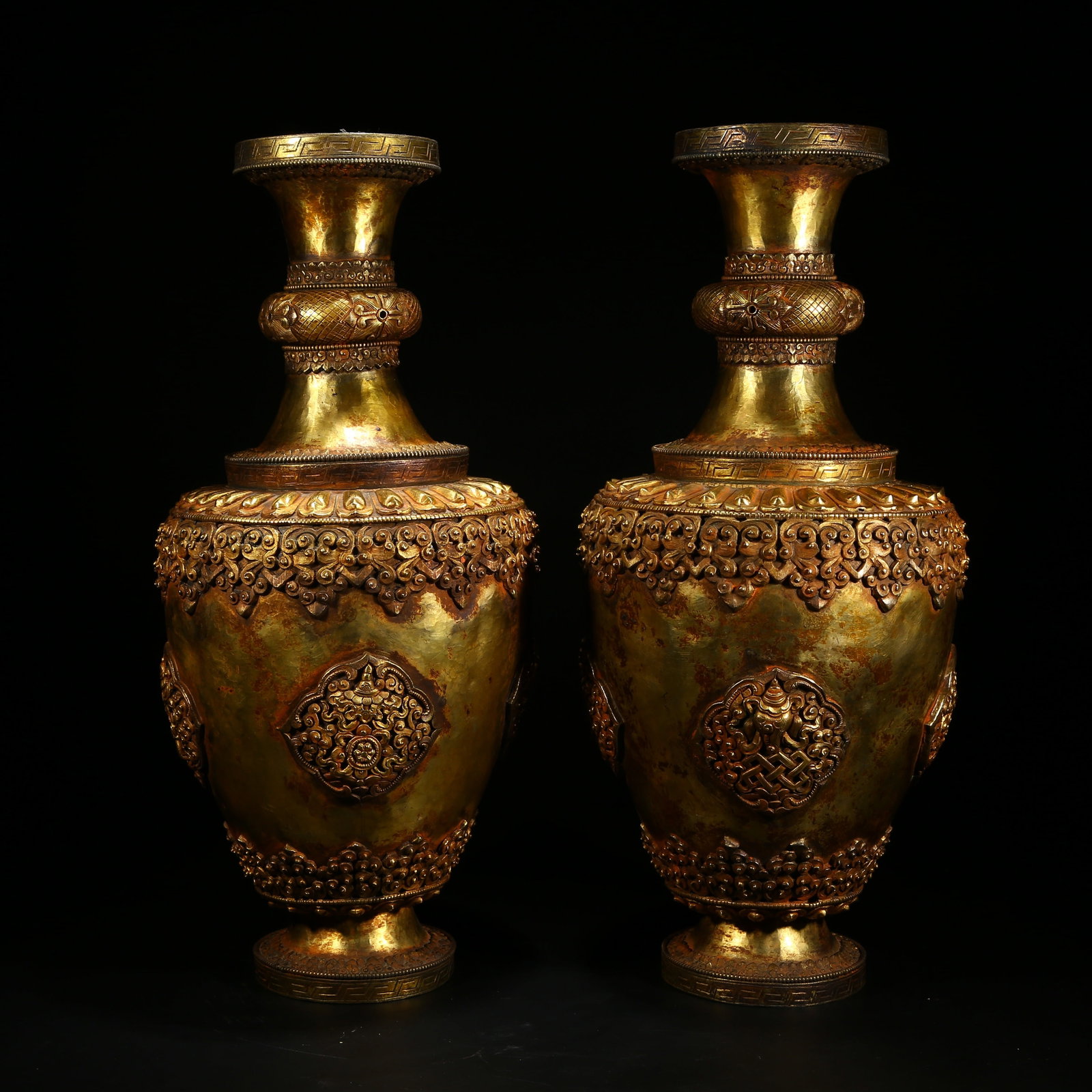 A SET OF GILDED BRONZE TREASURE VASES WITH EIGHT AUSPICIOUS SYMBOLS: A set of gilded bronze treasure vases with Eight Auspicious Symbols