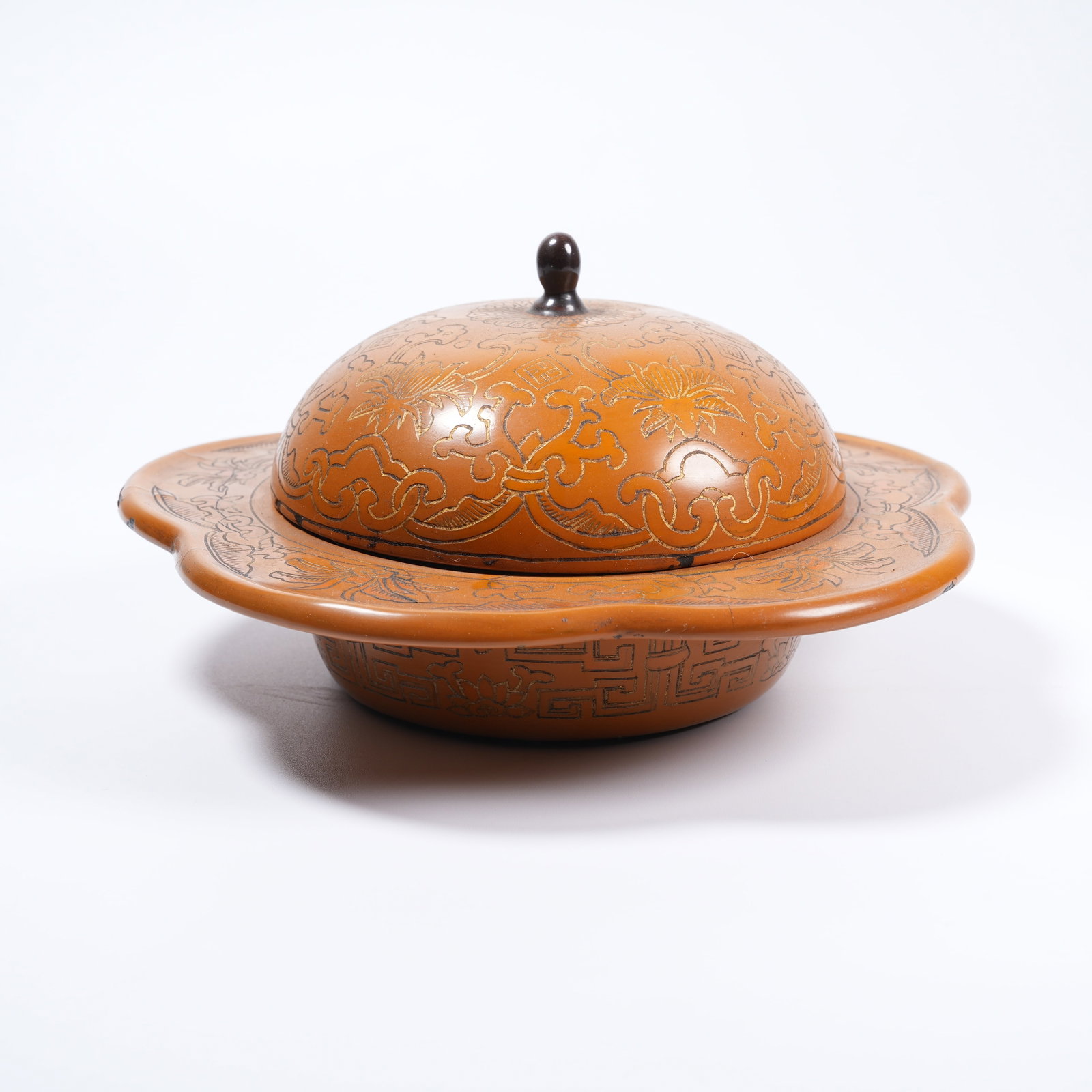 A CARVED LACQUER COVERED BOWL: Carved Lacquer Covered Bowl