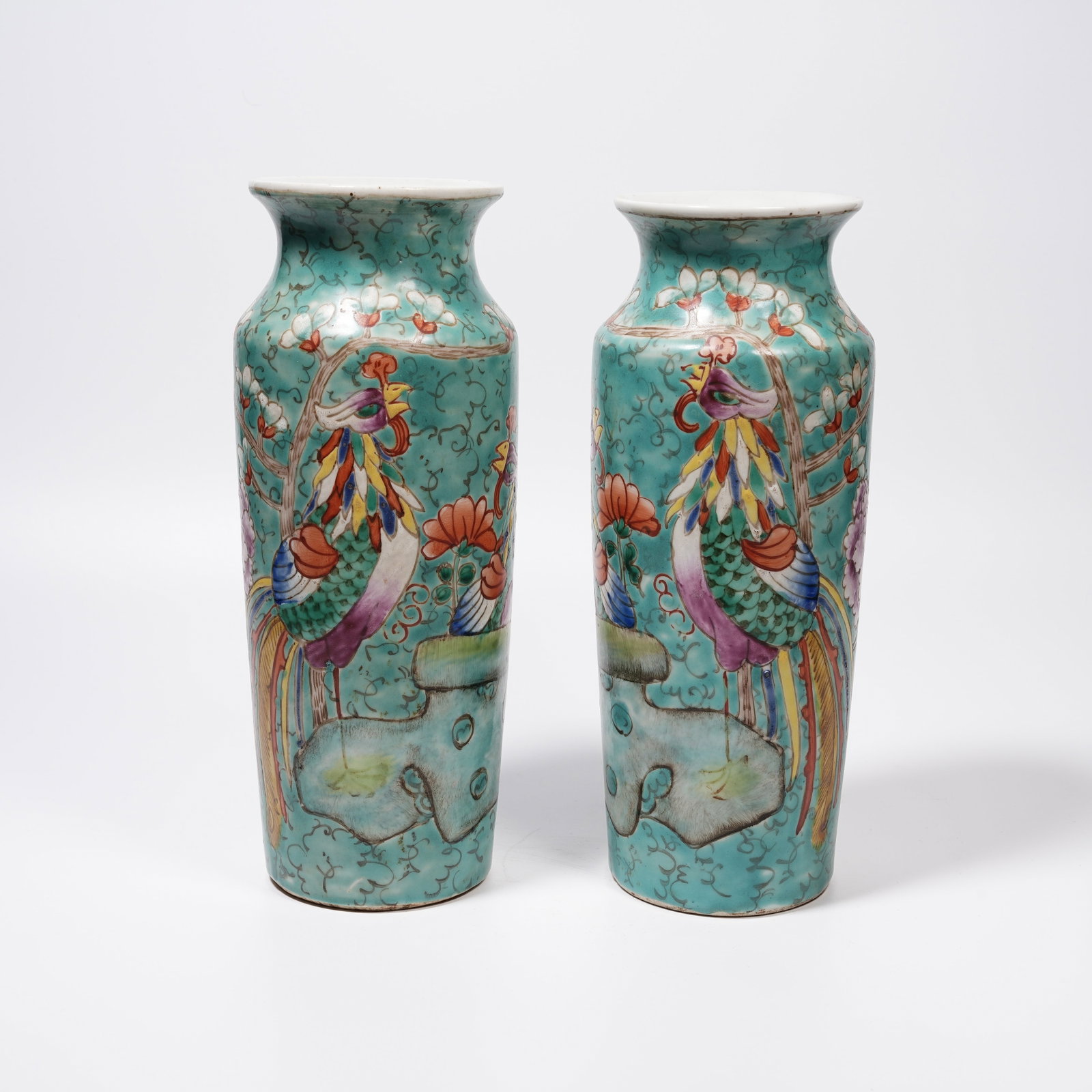 A SET OF FAMILLE ROSE CYLINDRICAL VASES WITH PHOENIX AMIDST FLOWERS PATTERN: Set of Famille Rose Cylindrical Vases with Phoenix Amidst Flowers Pattern