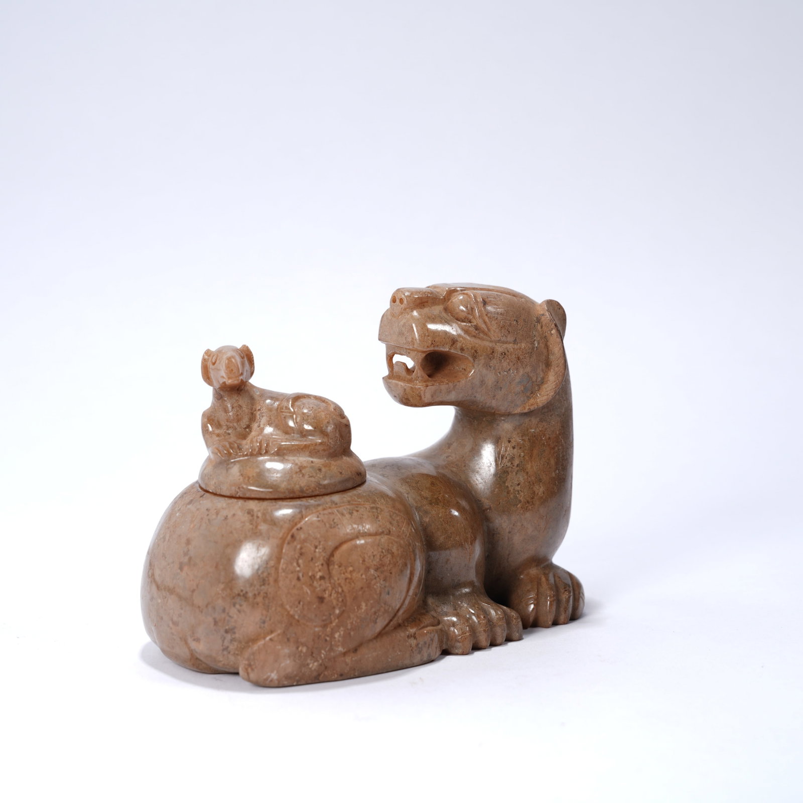 A ANCIENT JADE "TURNING-BACK BEAST" RITUAL VESSEL (1 of 7)