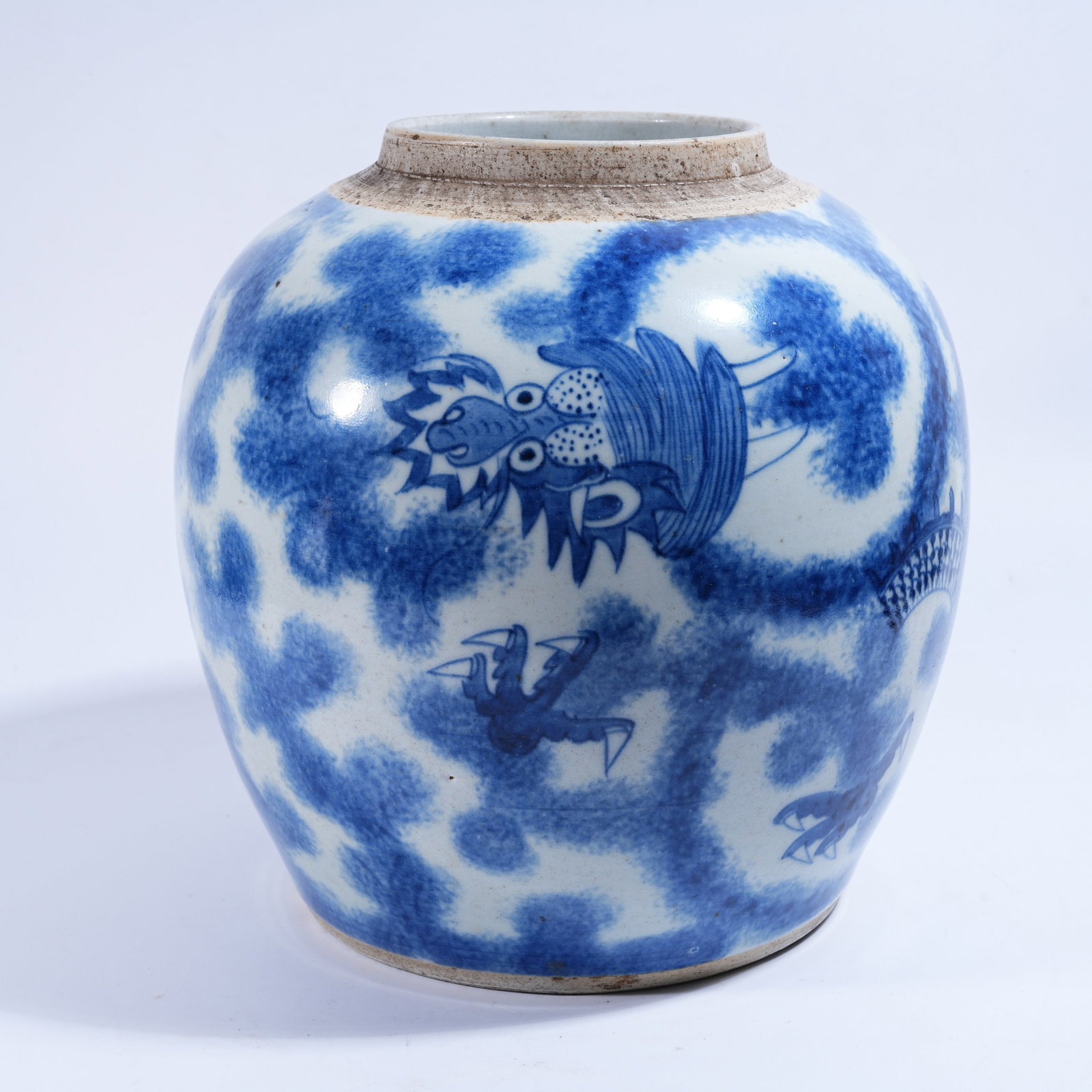 A BLUE AND WHITE JAR WITH CLOUD AND DRAGON PATTERN (1 of 9)