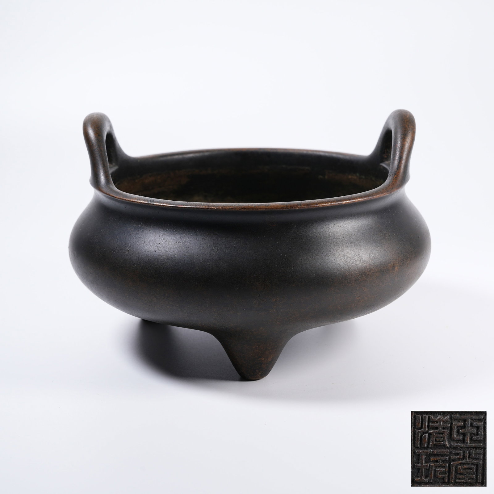 A THREE-LEGGED BRONZE UPRIGHT EARED CENSER (1 of 9)