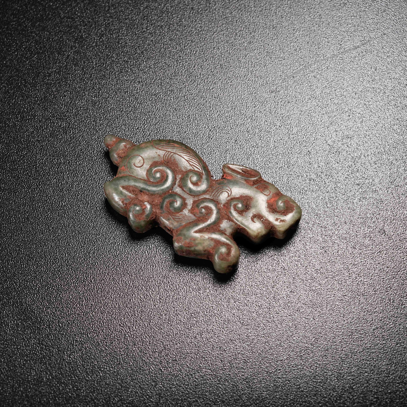 A ANCIENT JADE BEAST PENDANT: Ancient Jade Beast Pendant
