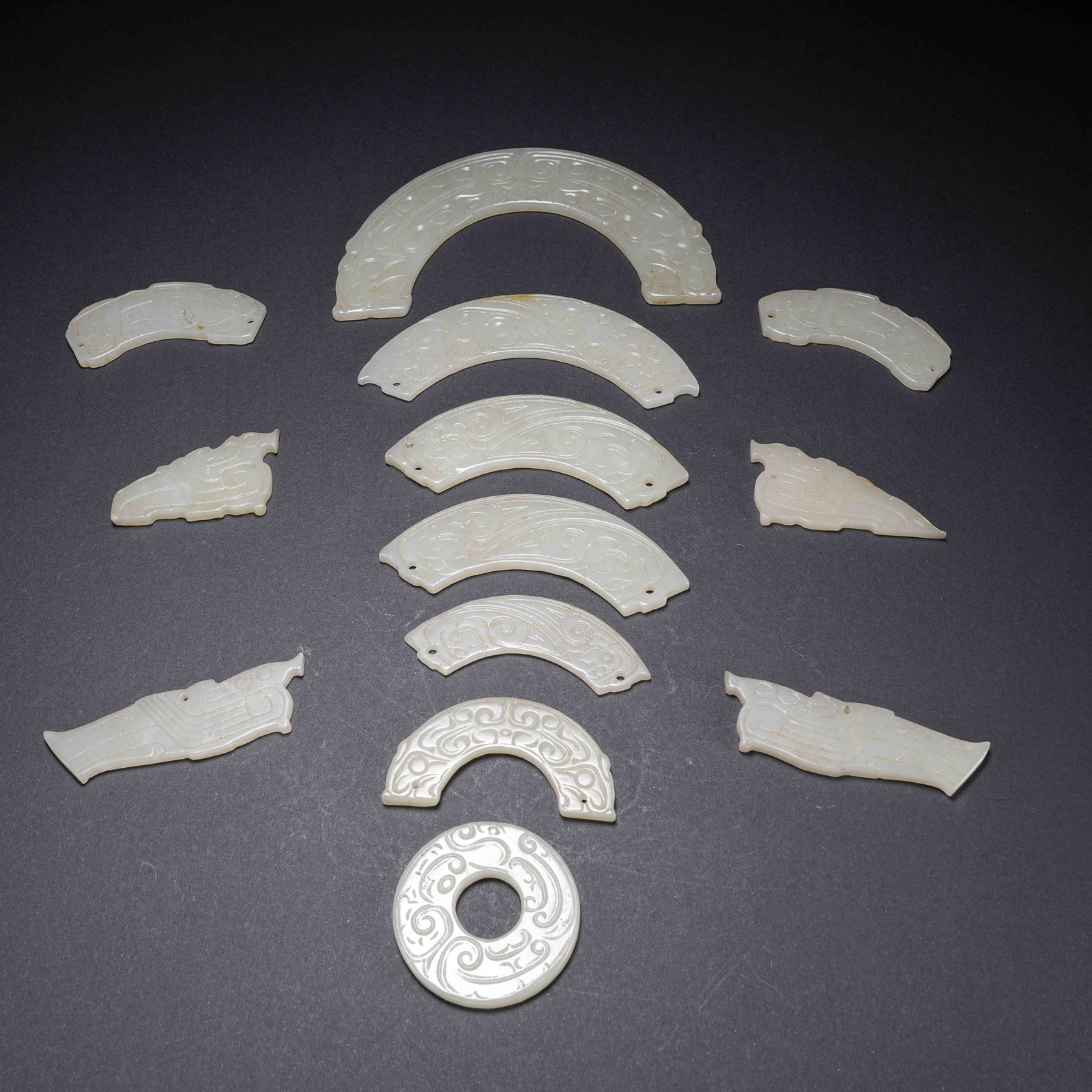 A ANCIENT JADE PENDANT SETS: Ancient Jade Pendant Sets