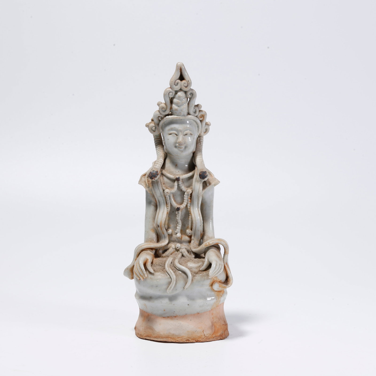 A WHITE-GLAZED BUDDHA STATUE: White-Glazed Buddha Statue
