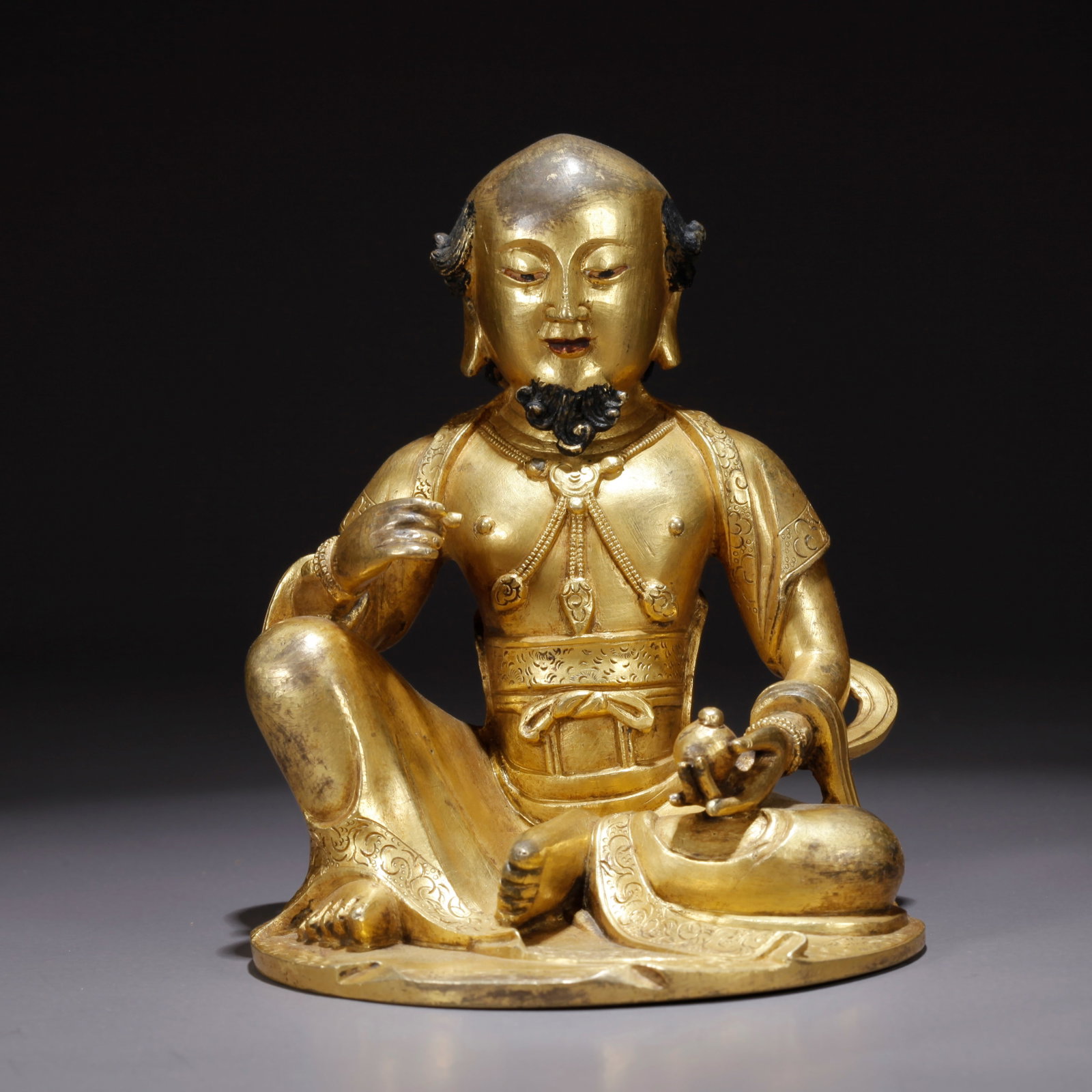 A GILDED BRONZE MALE-FORM AVALOKITESHVARA STATUE: Gilded Bronze Male-Form Avalokiteshvara Statue