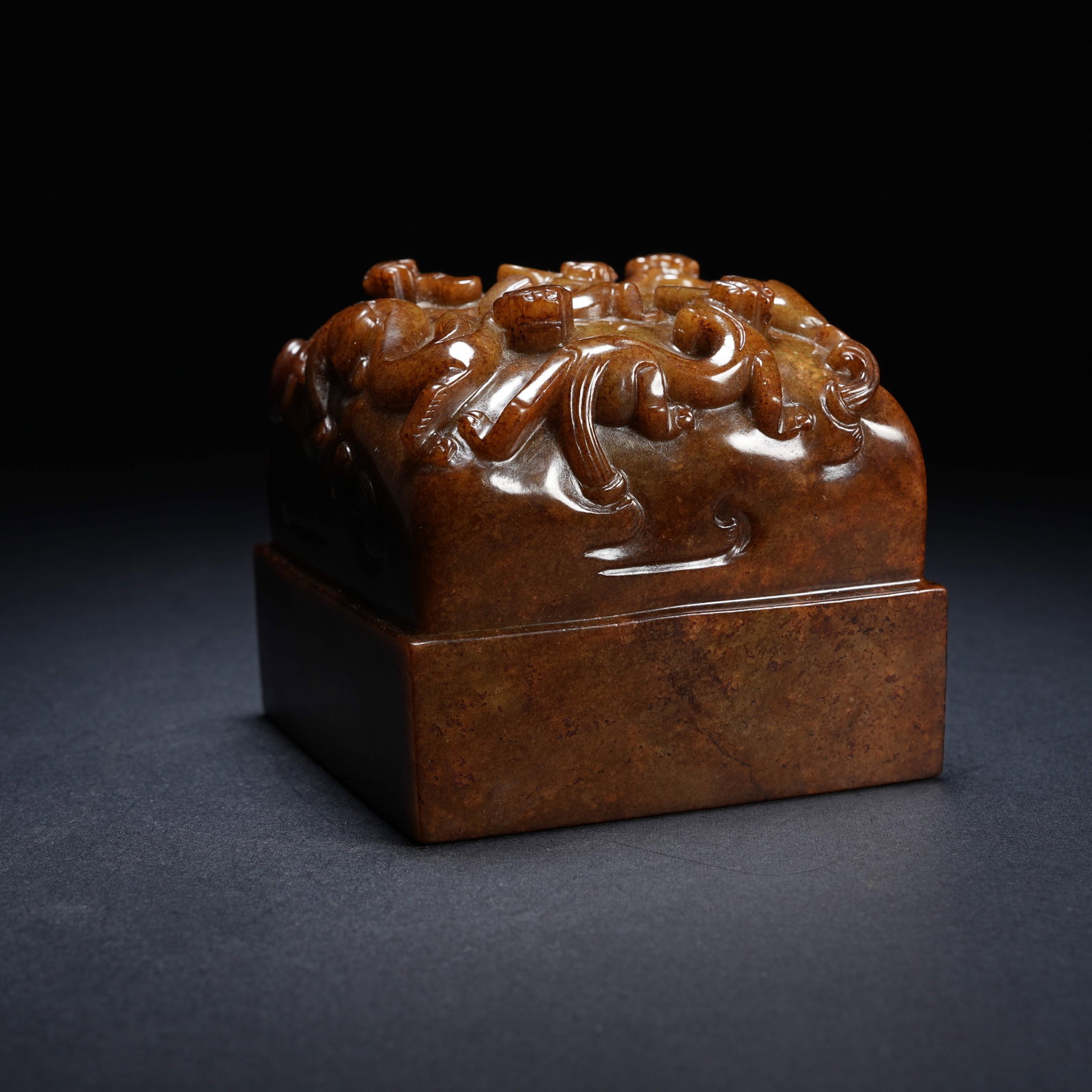A ARCHAIC JADE FIVE-DRAGON SEAL: Archaic jade five-dragon seal