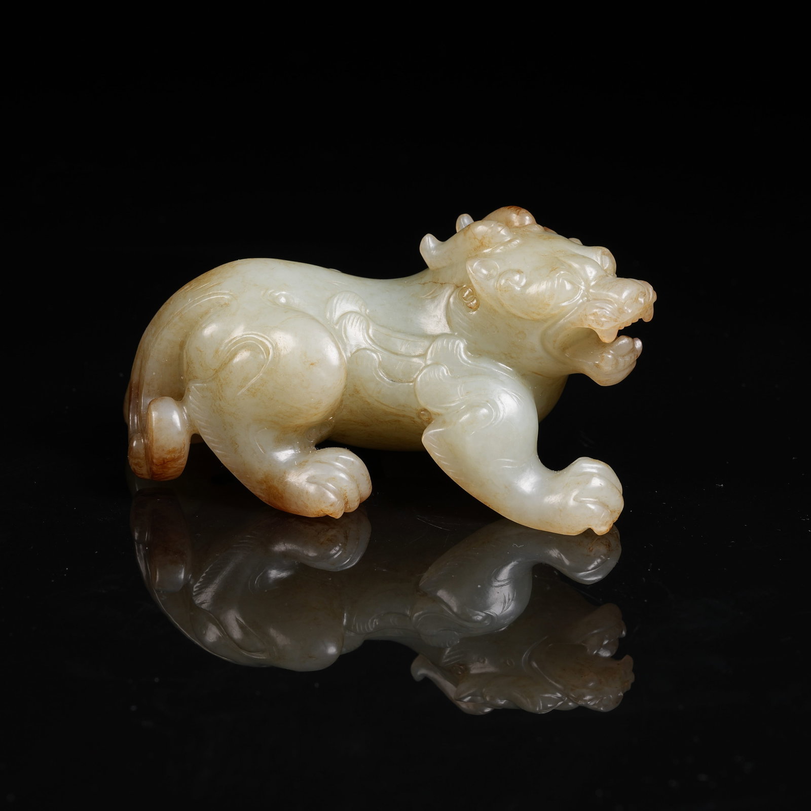 A ARCHAIC JADE AUSPICIOUS BEAST ORNAMENT: Archaic Jade Auspicious Beast Ornament