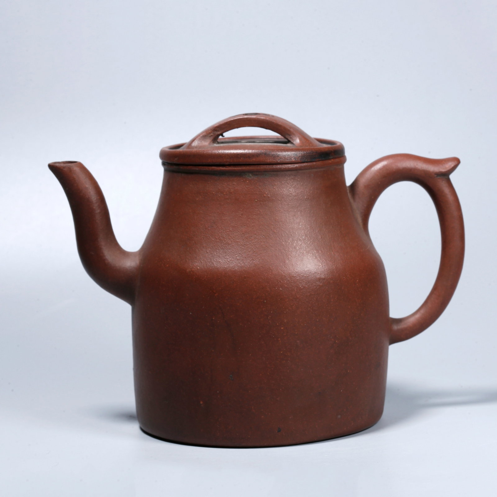 A ZISHA (YIXING) CARVED TEAPOT: Zisha (Yixing) Carved Teapot