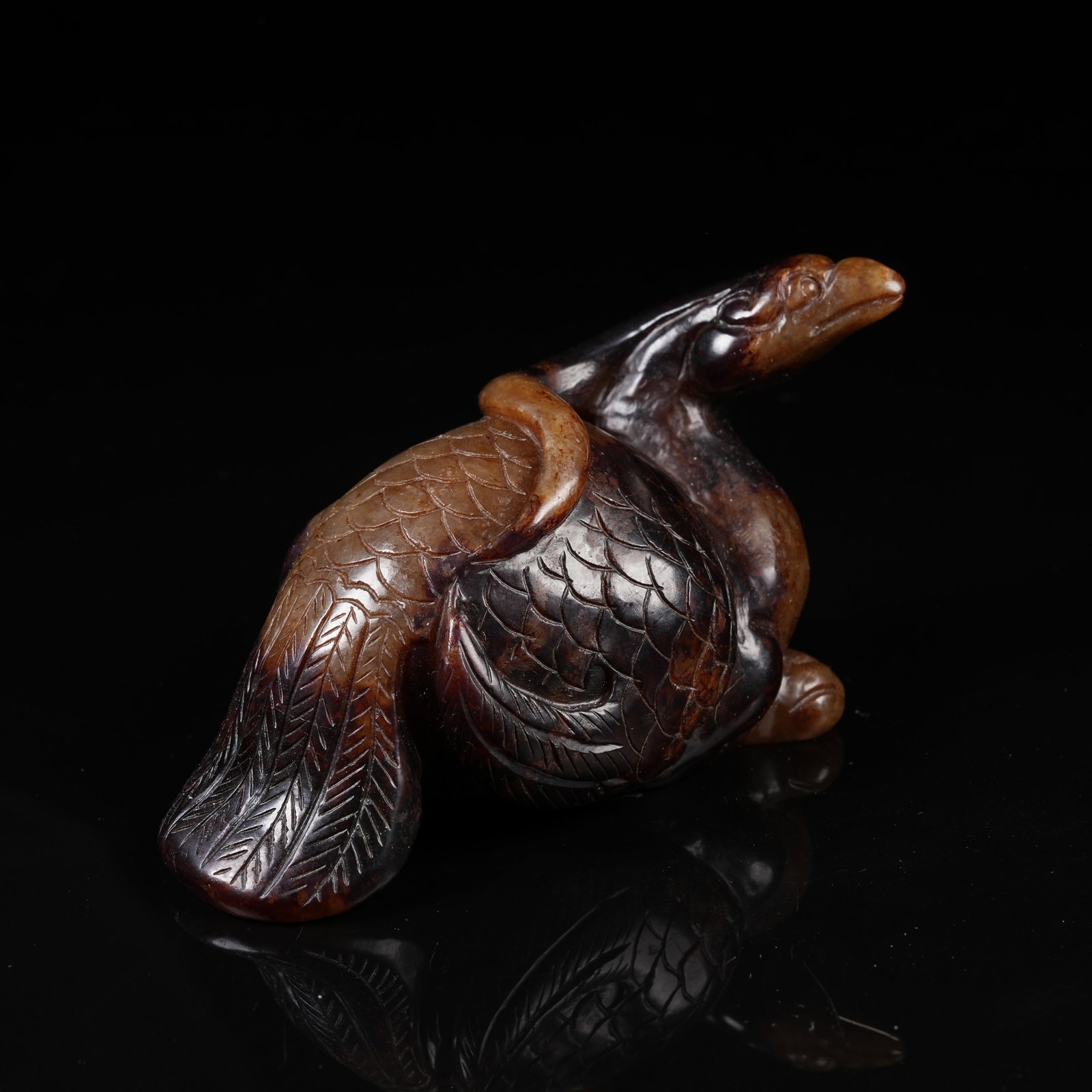 A ARCHAIC JADE PHOENIX ORNAMENT (1 of 8)