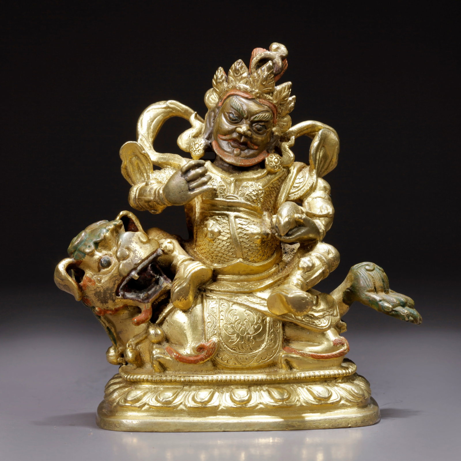 A GILDED BRONZE WEALTH GOD STATUE: Gilded Bronze Wealth God Statue