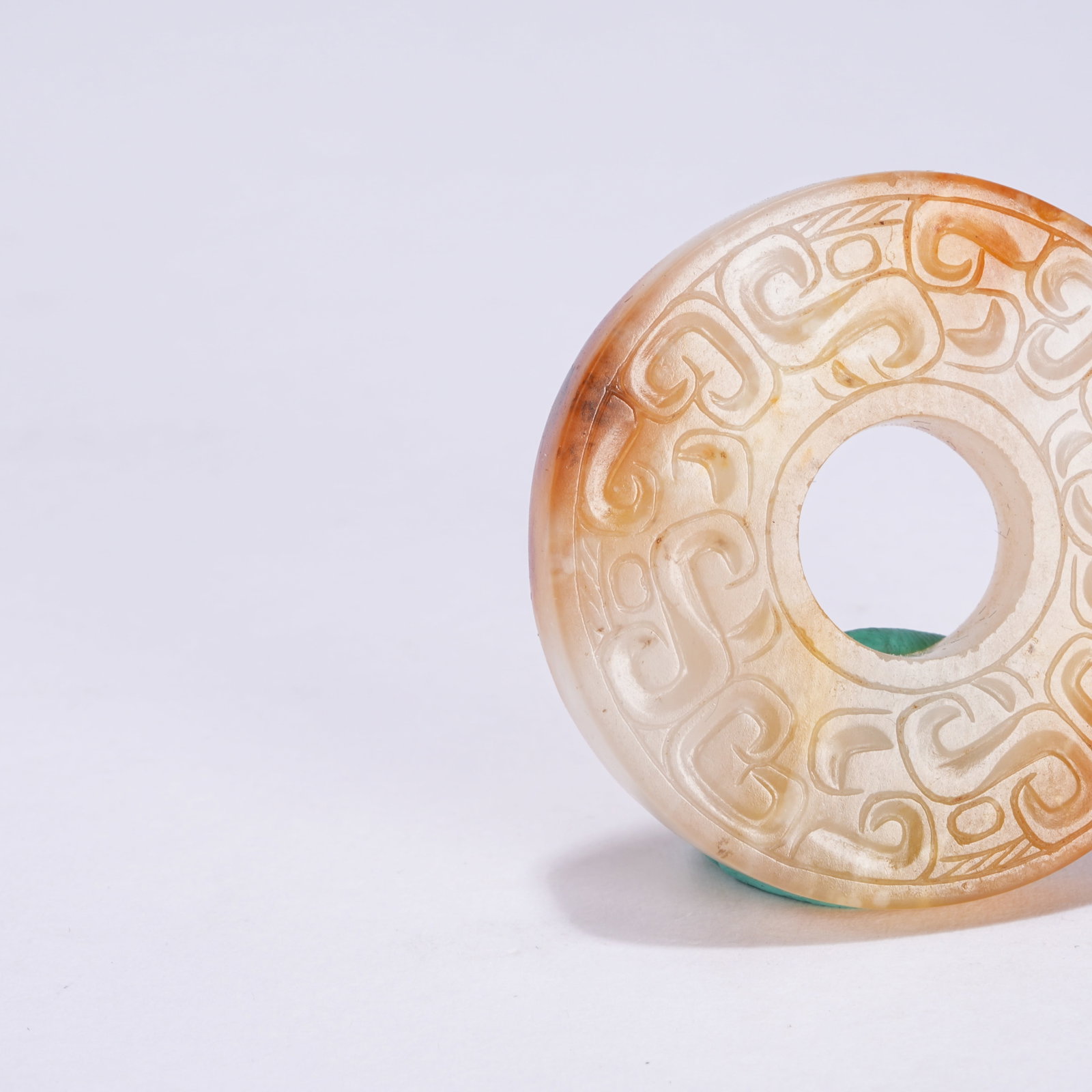 A ANCIENT JADE BI DISC WITH CLOUD SCROLL PATTERN - 2