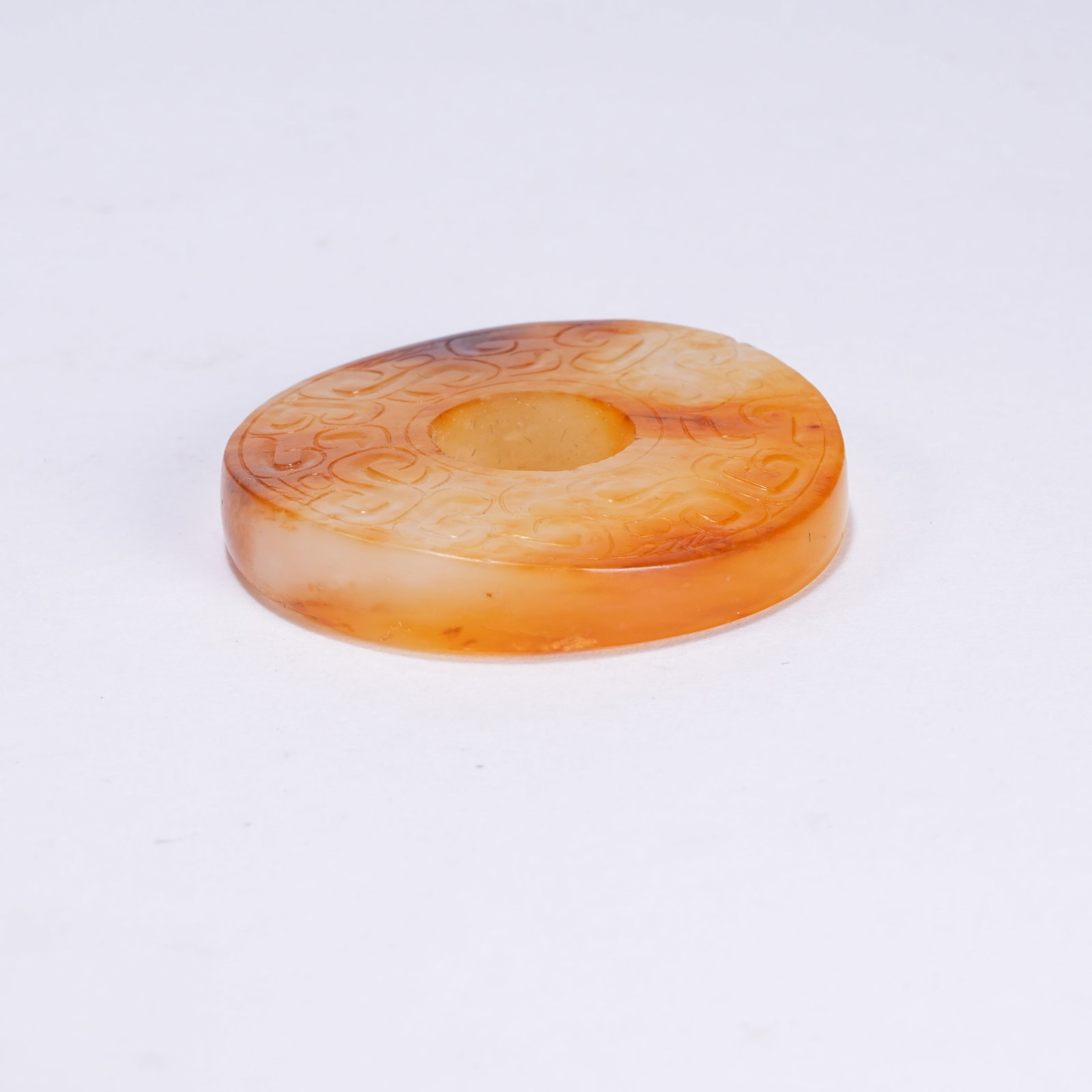 A ANCIENT JADE BI DISC WITH CLOUD SCROLL PATTERN - 9