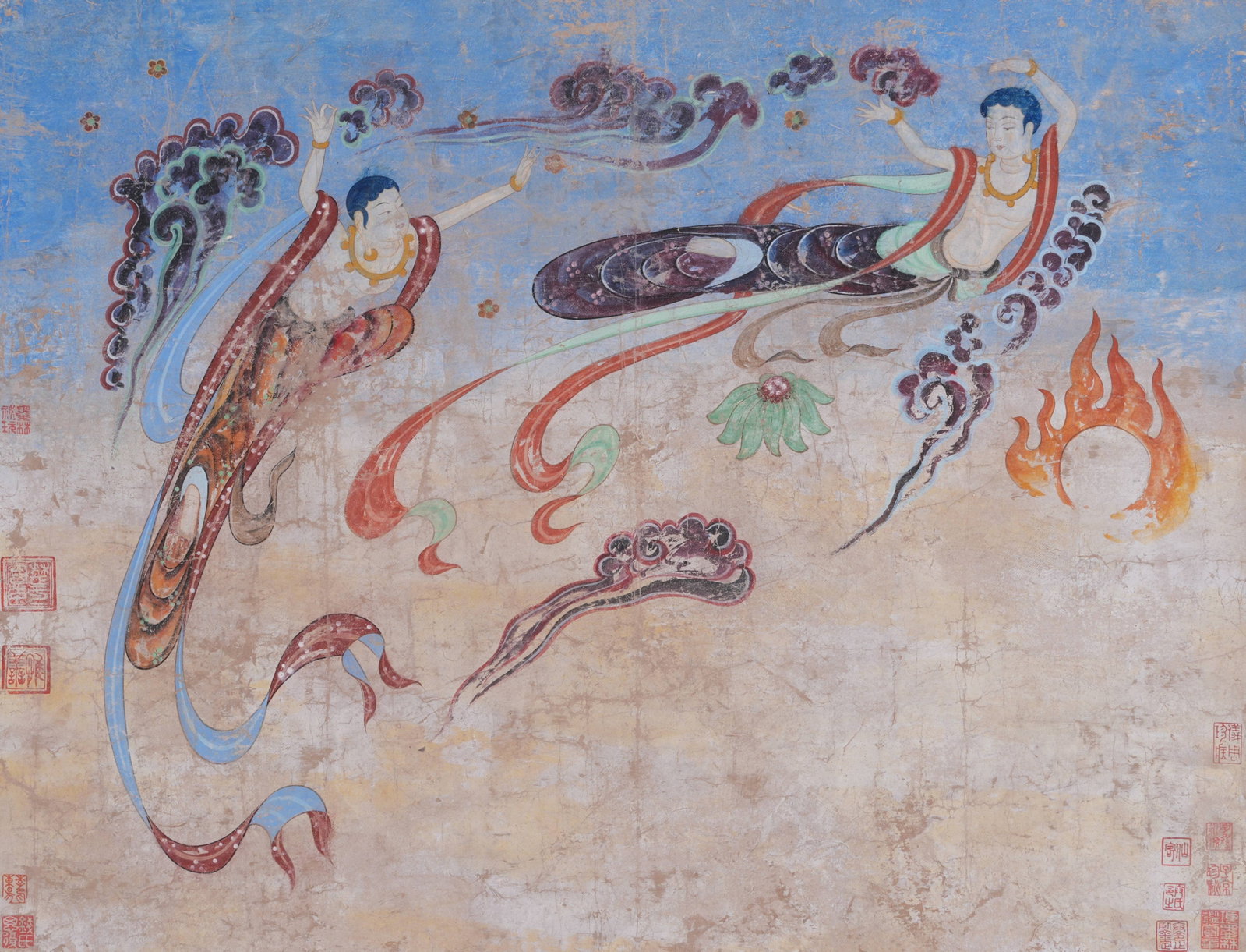 A DUNHUANG FLYING APSARAS PAINTING MOUNT ON PAPER BY ANONYMOUS. (1 of 10)