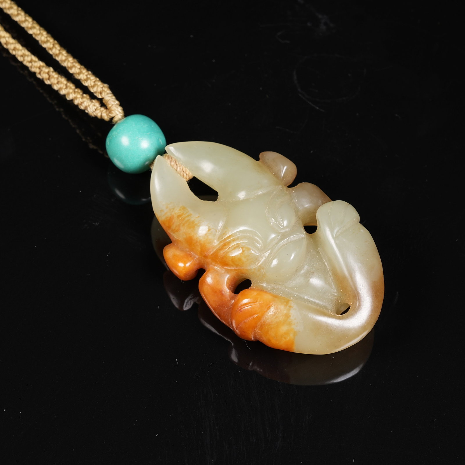 A ARCHAIC JADE SUN GOD PENDANT: Archaic Jade Sun God Pendant