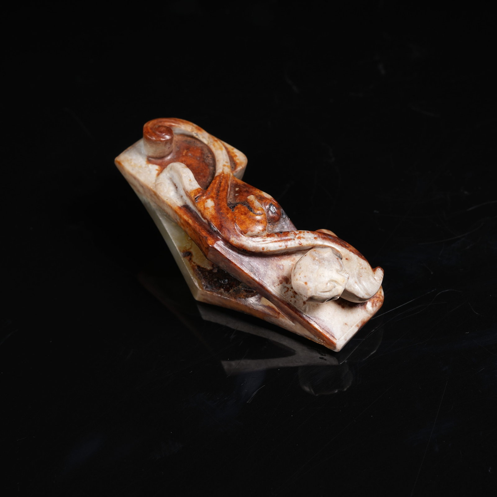 A ARCHAIC JADE SWORD GUARD (1 of 8)