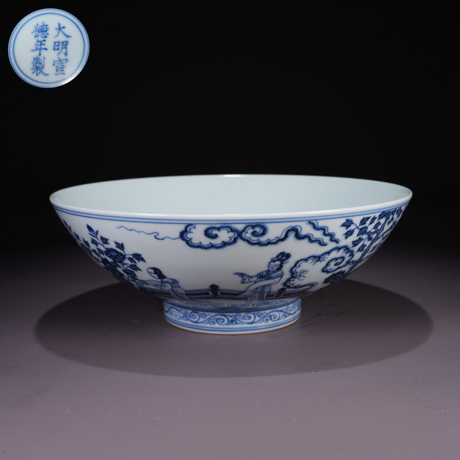 A LARGE BLUE-AND-WHITE BOWL WITH COURT LADY IN GARDEN SCENE: Large Blue-and-White Bowl with Court Lady in Garden Scene